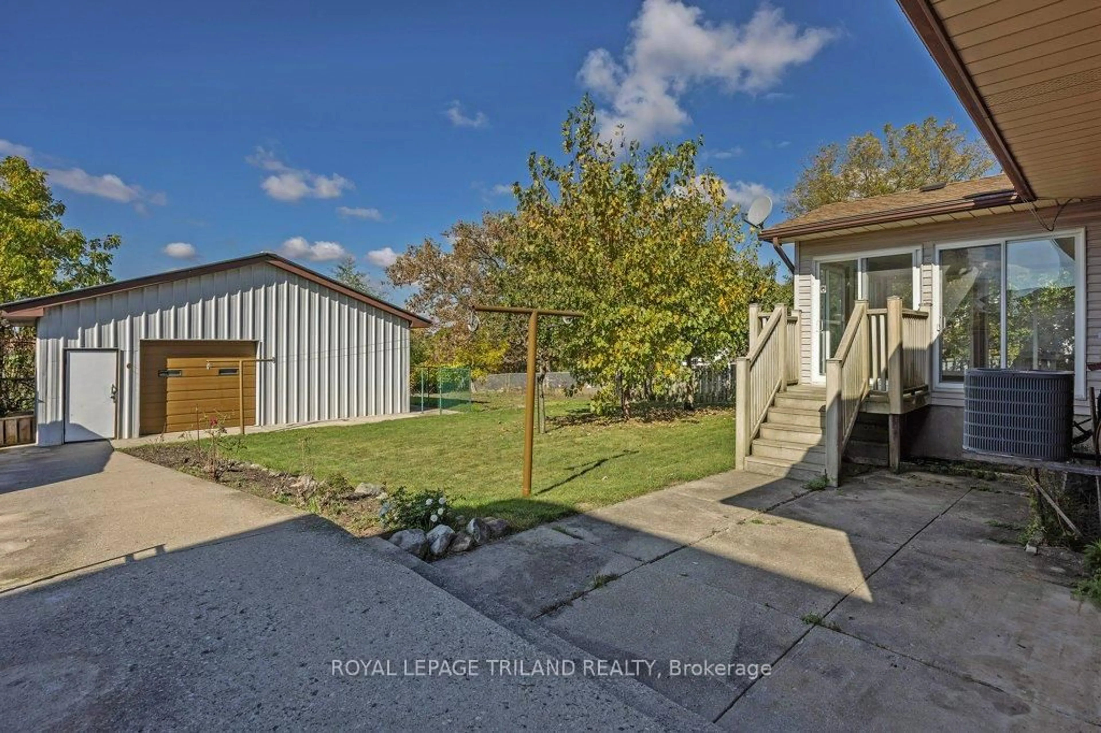 A pic from outside/outdoor area/front of a property/back of a property/a pic from drone, water/lake/river/ocean view for 66 Park Ave, St. Thomas Ontario N5R 4W1