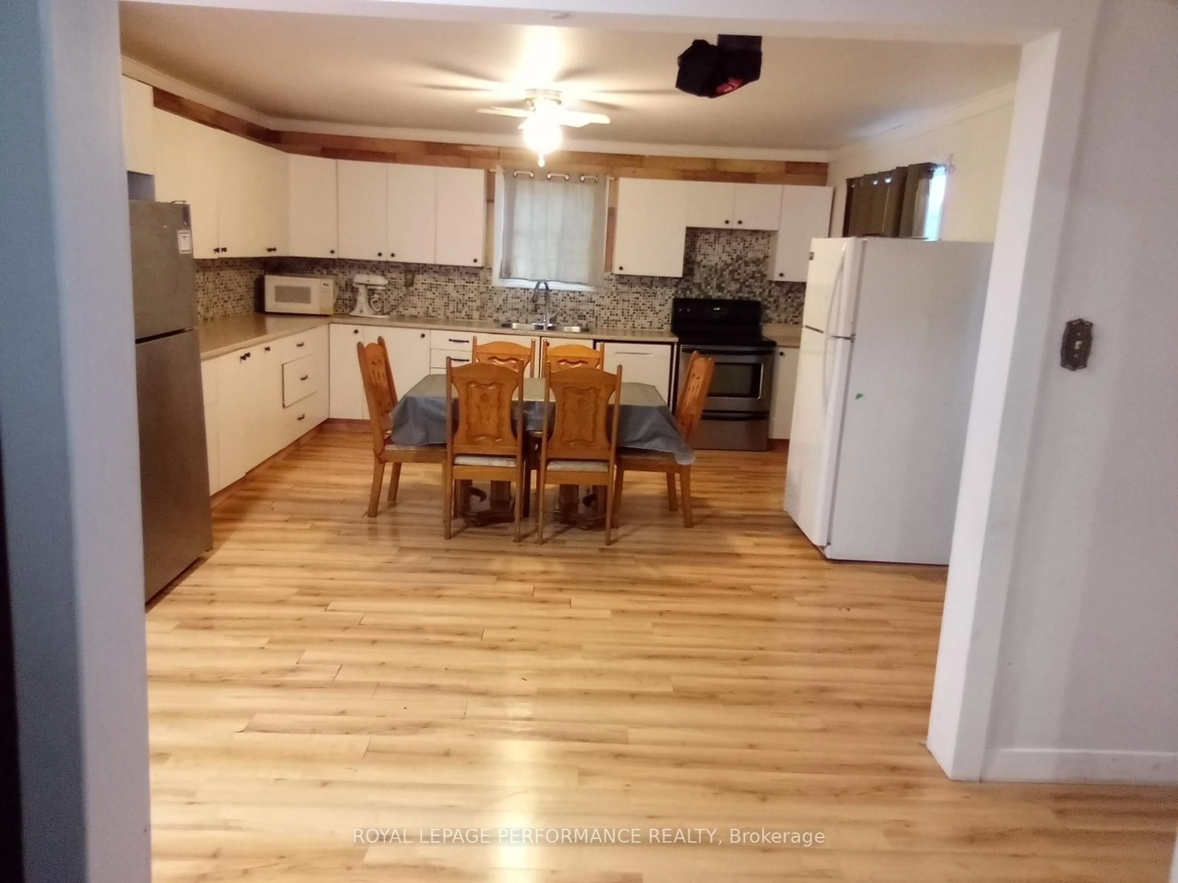 Open concept kitchen, wood/laminate floor for 235 Main St, North Glengarry Ontario K0C 1A0