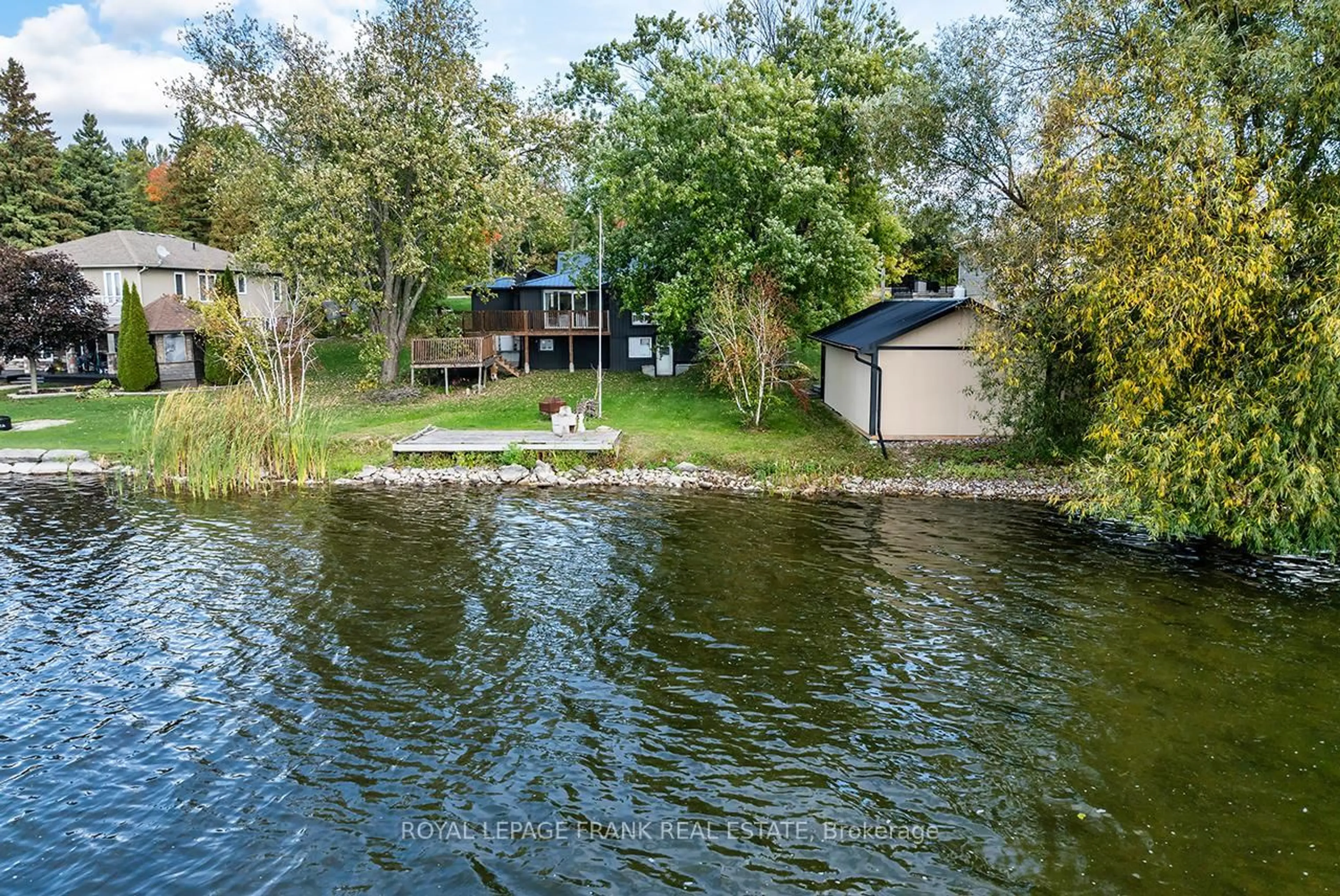 A pic from outside/outdoor area/front of a property/back of a property/a pic from drone, water/lake/river/ocean view for 119 Oakdene Cres, Kawartha Lakes Ontario K0M 2C0