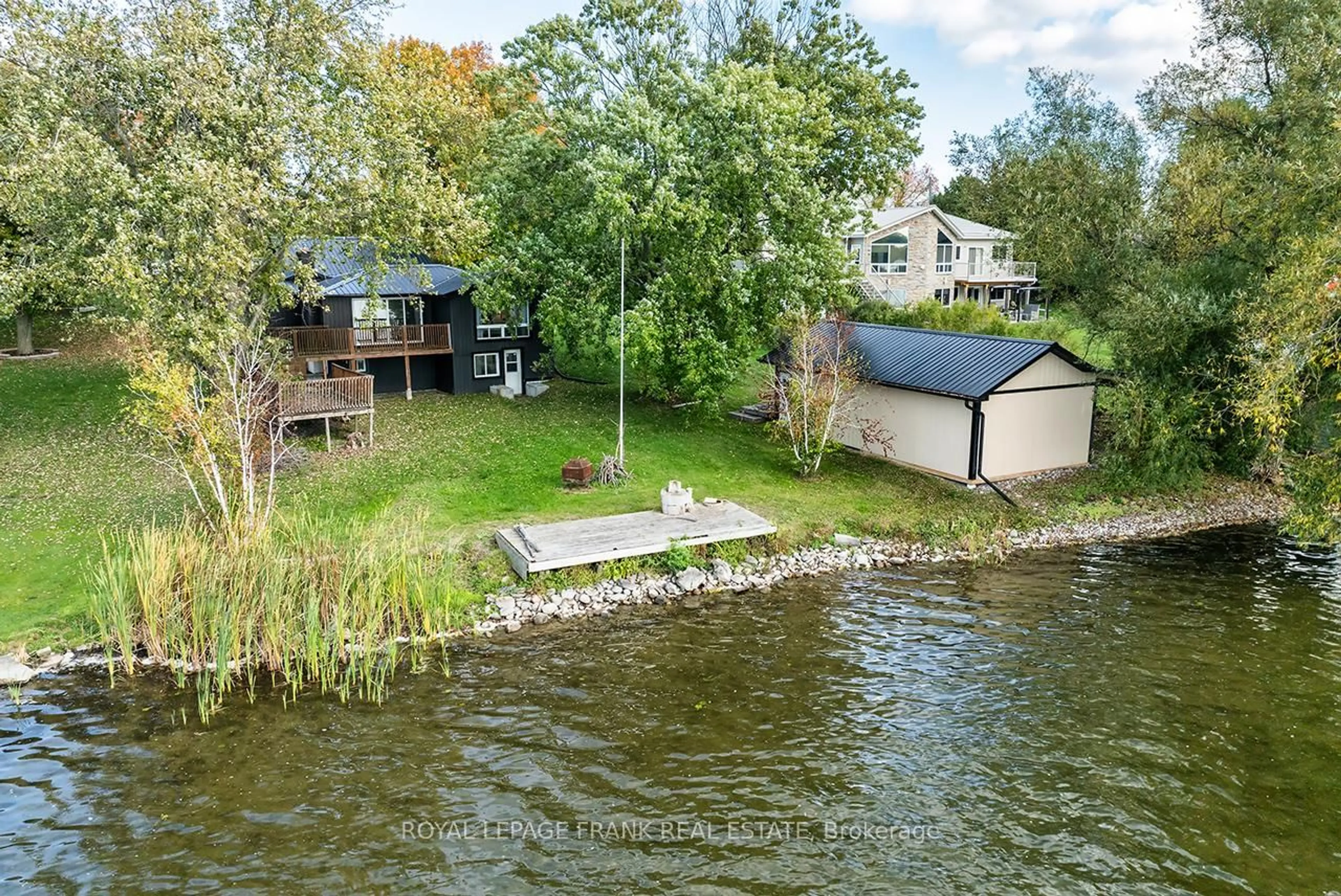 A pic from outside/outdoor area/front of a property/back of a property/a pic from drone, water/lake/river/ocean view for 119 Oakdene Cres, Kawartha Lakes Ontario K0M 2C0