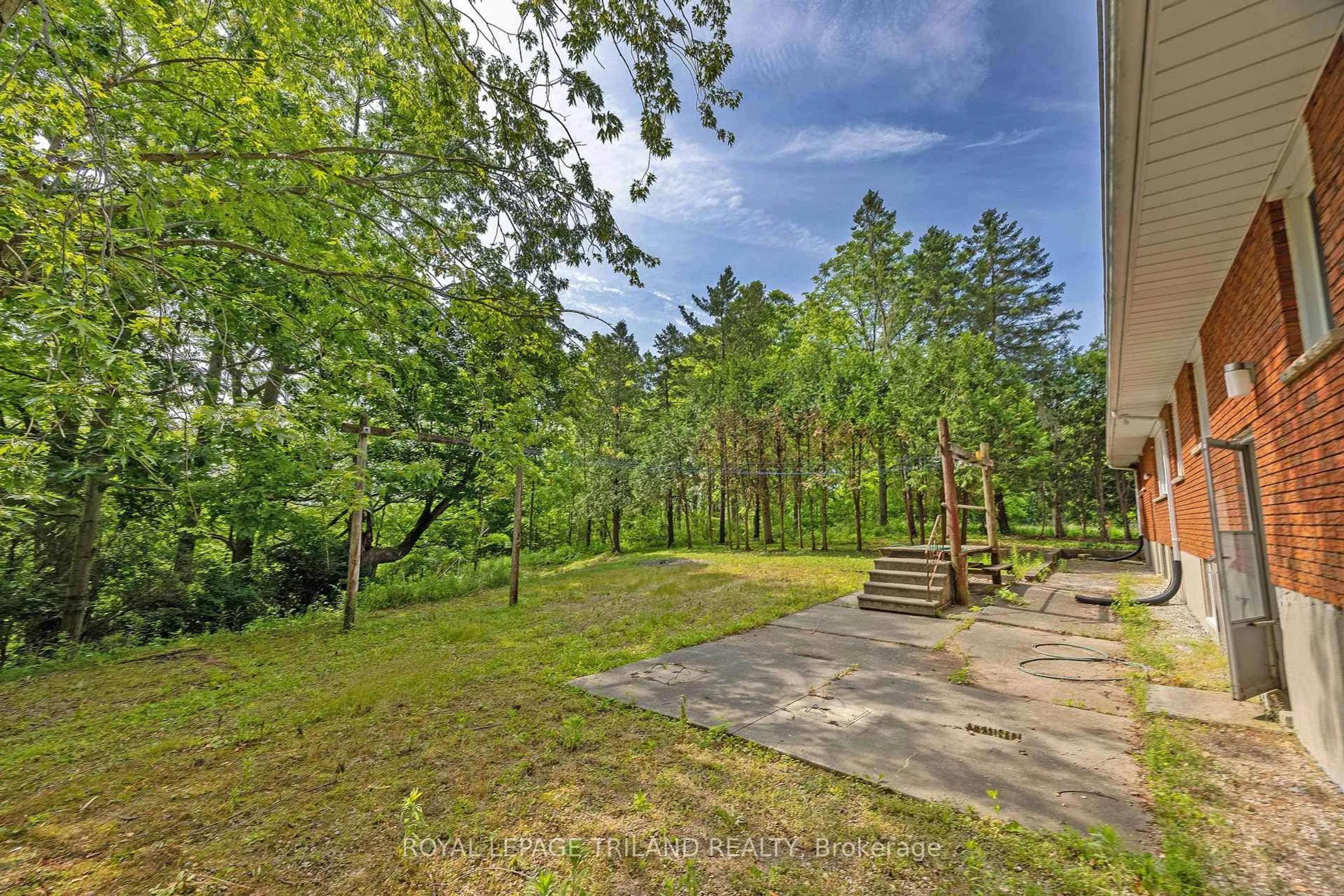 A pic from outside/outdoor area/front of a property/back of a property/a pic from drone, forest/trees view for 39339 Bush Line, St. Thomas Ontario N5P 3S9
