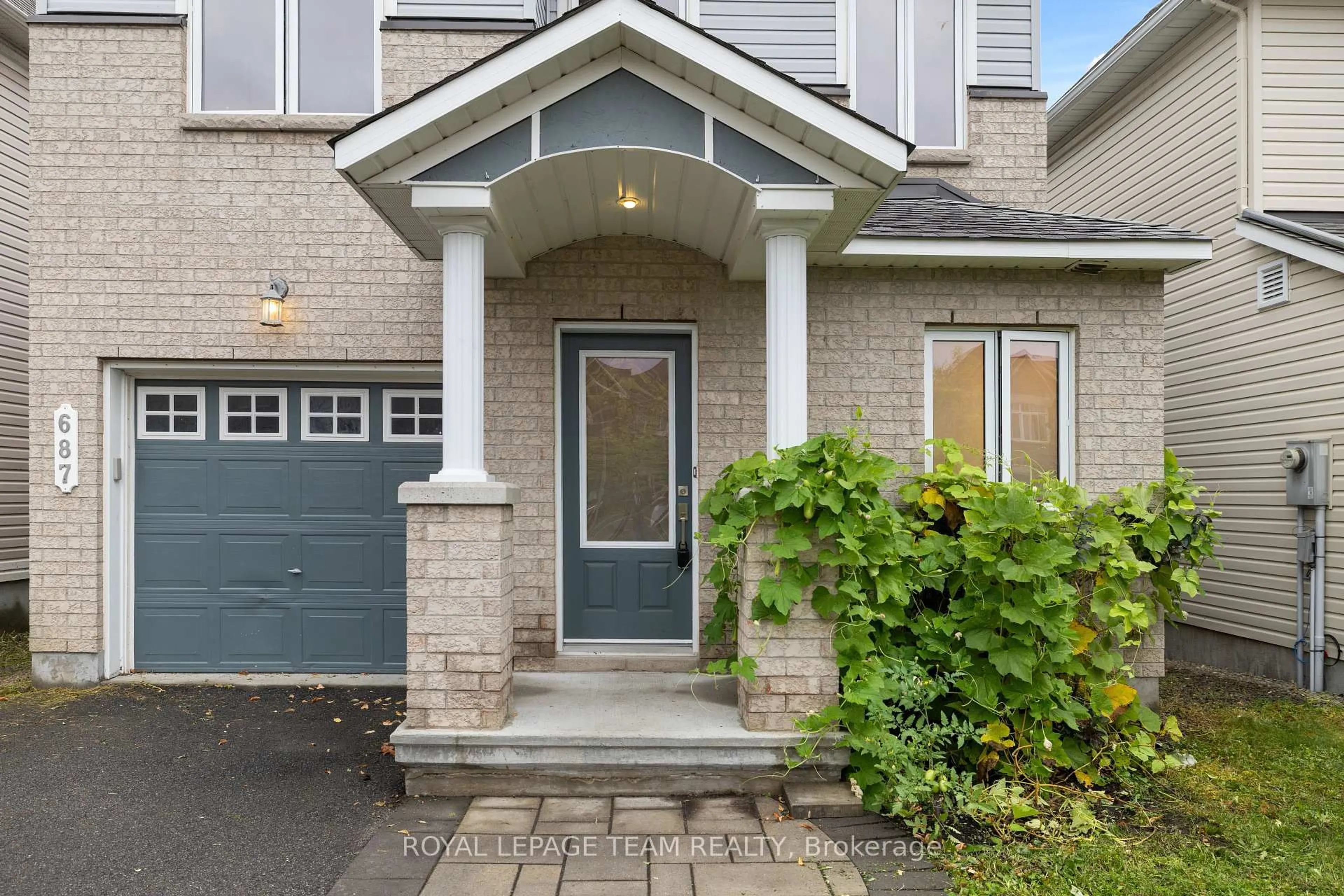 Home with brick exterior material, street for 687 Paul Metivier Dr, Ottawa Ontario K2J 2T4