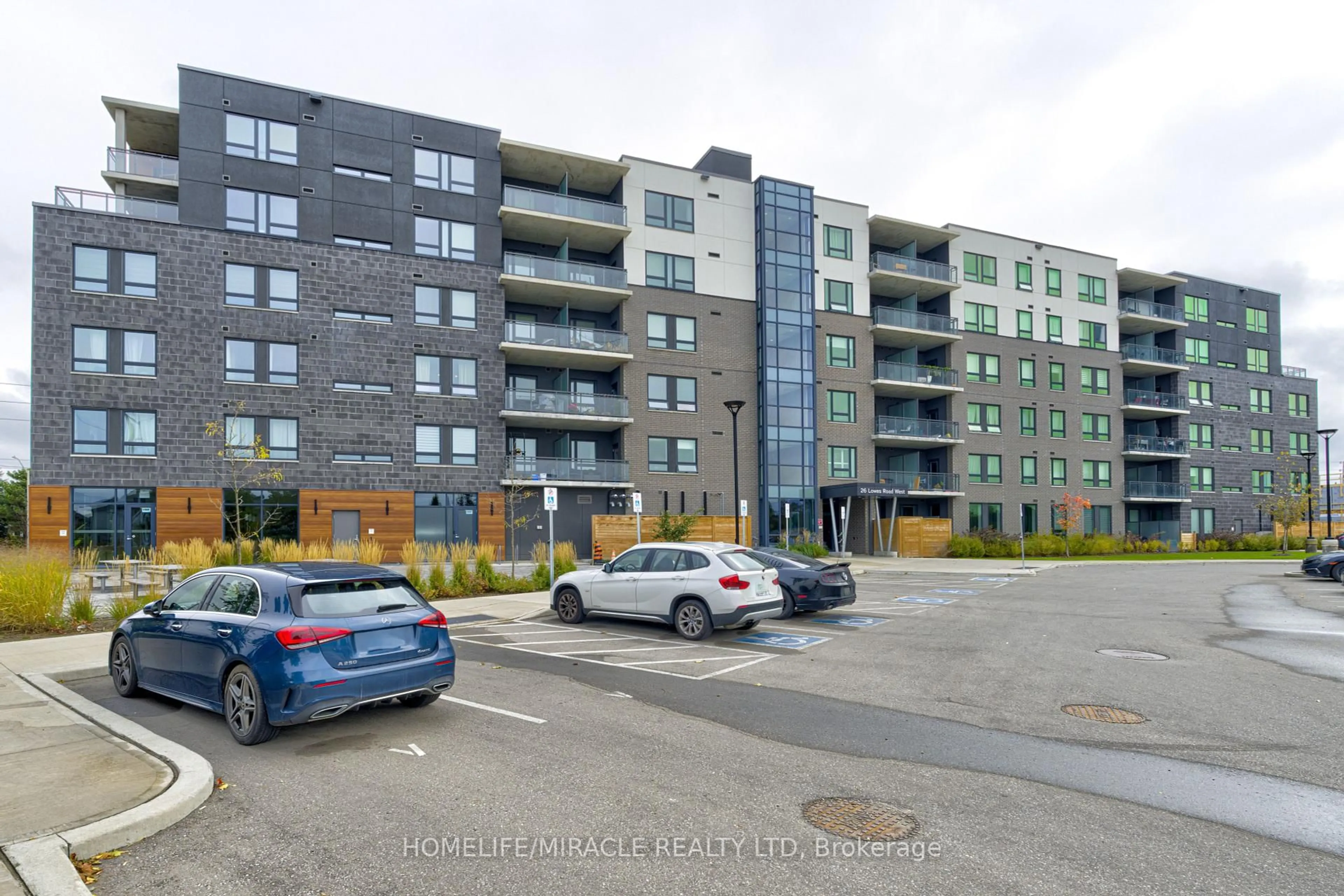 A pic from outside/outdoor area/front of a property/back of a property/a pic from drone, street for 26 Lowes Rd #402, Guelph Ontario N1G 4X2
