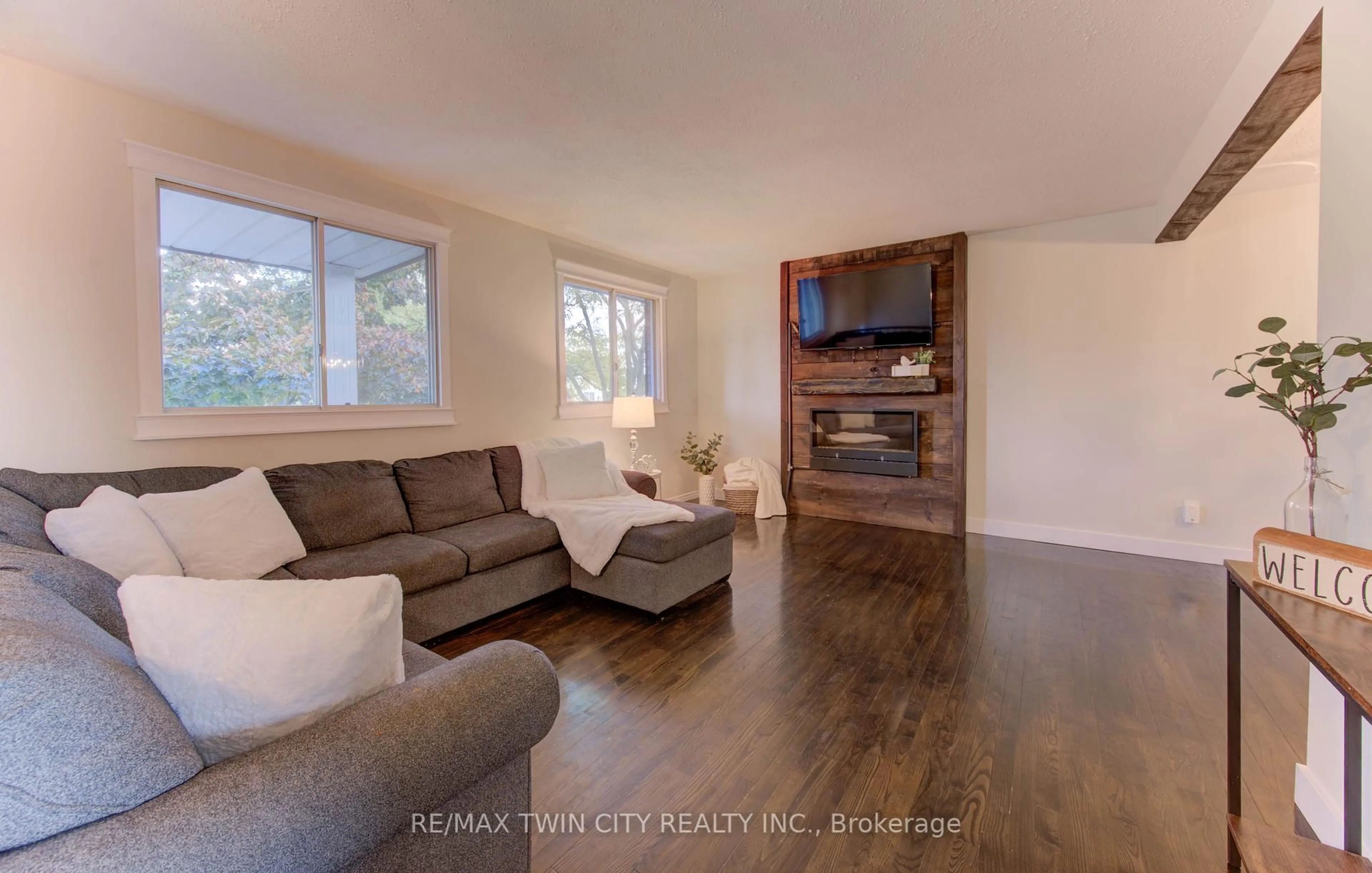 Living room with furniture, wood/laminate floor for 194 Limpert Ave, Cambridge Ontario N3C 3P2