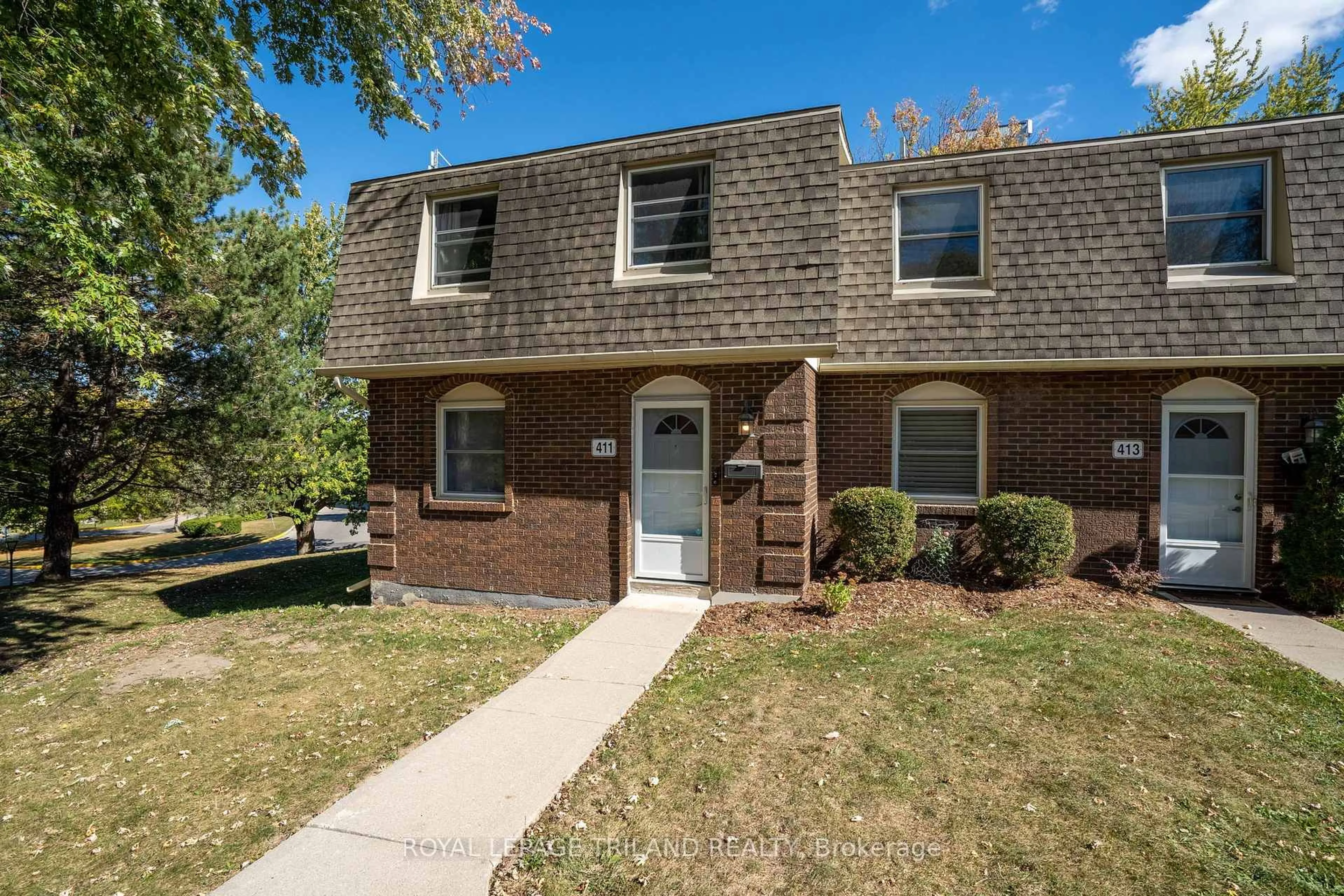 Home with brick exterior material, street for 411 Wilkins St, London South Ontario N6C 5B5