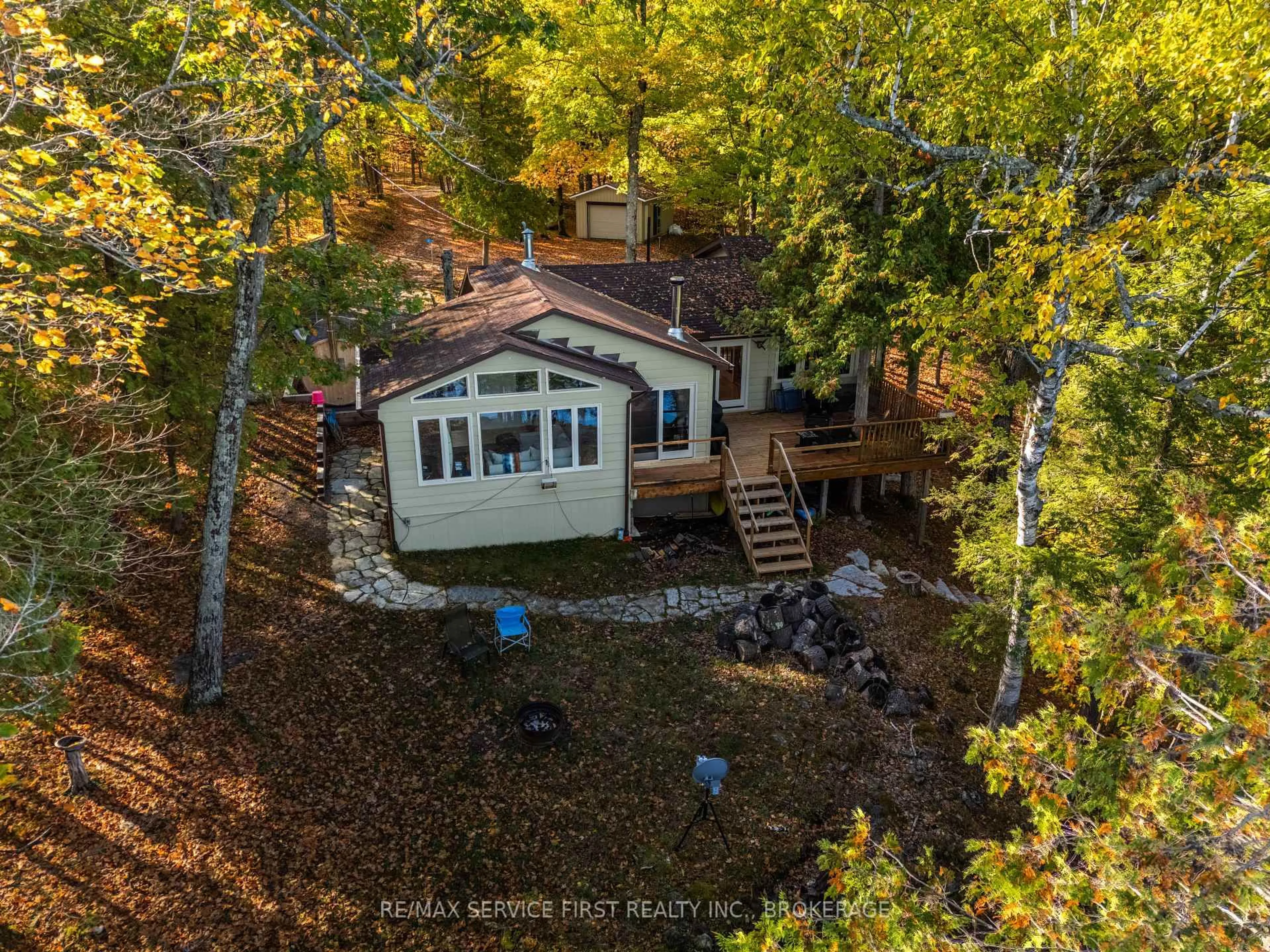 A pic from outside/outdoor area/front of a property/back of a property/a pic from drone, water/lake/river/ocean view for 11 Lawton Lane, Rideau Lakes Ontario K0G 1E0