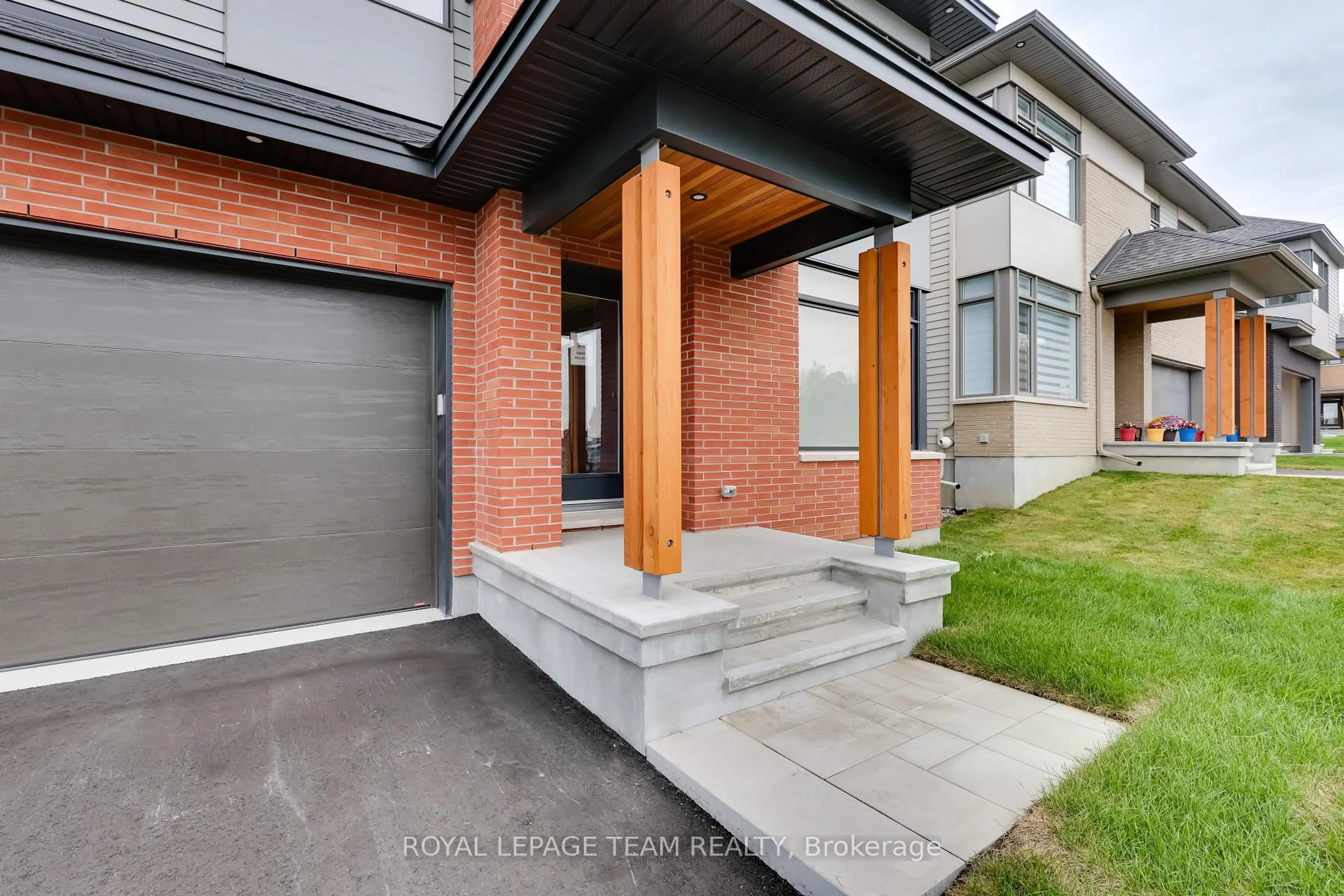 Home with brick exterior material, street for 405 Point Grey Terr, Kanata Ontario K2K 0M5