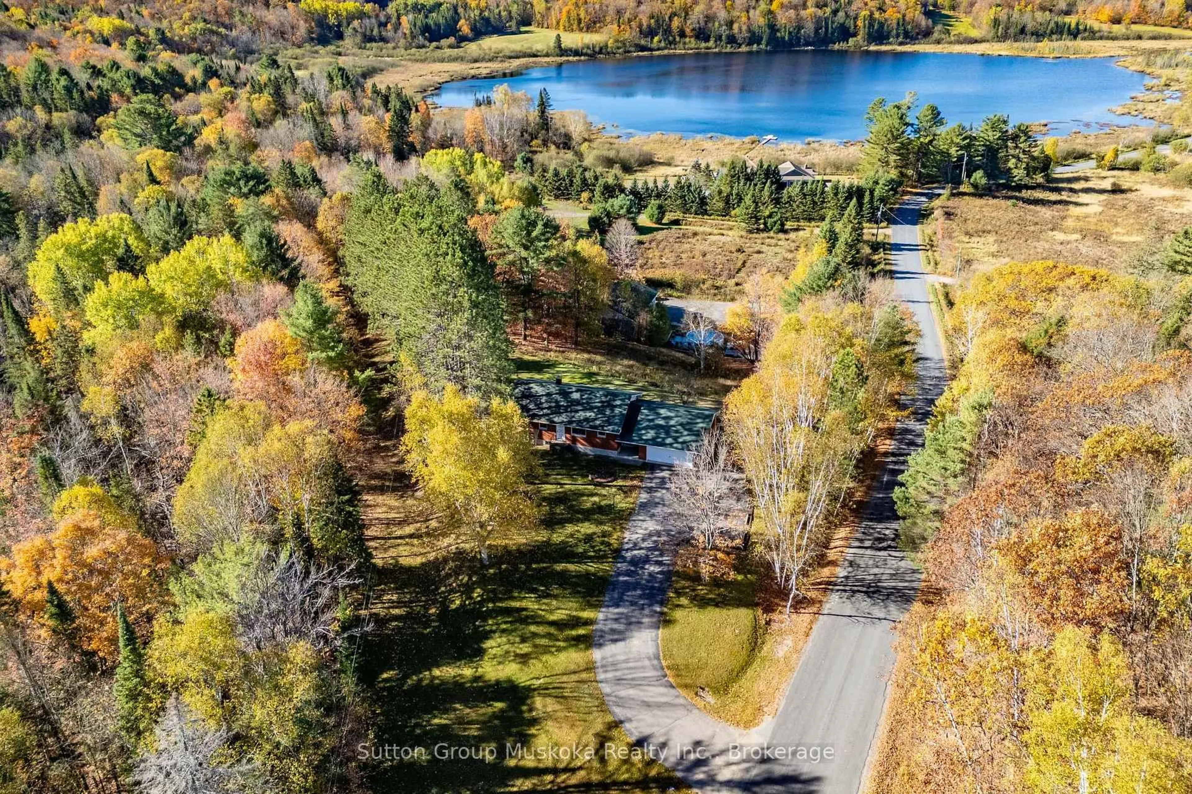 A pic from outside/outdoor area/front of a property/back of a property/a pic from drone, water/lake/river/ocean view for 467 West Browns Rd, Huntsville Ontario P1H 0H9