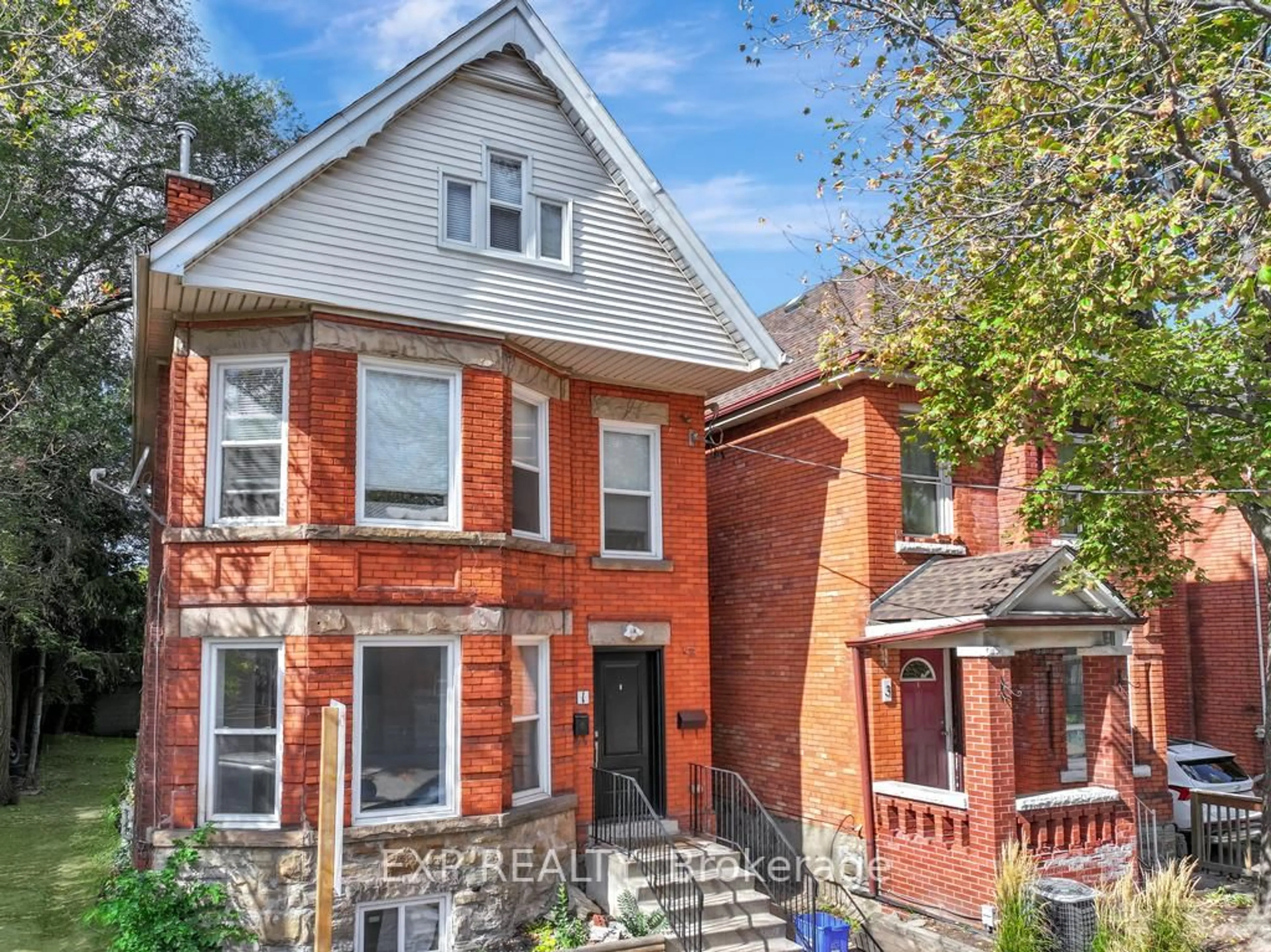 Home with brick exterior material, street for 1 madison Ave, Hamilton Ontario L8L 5Y2