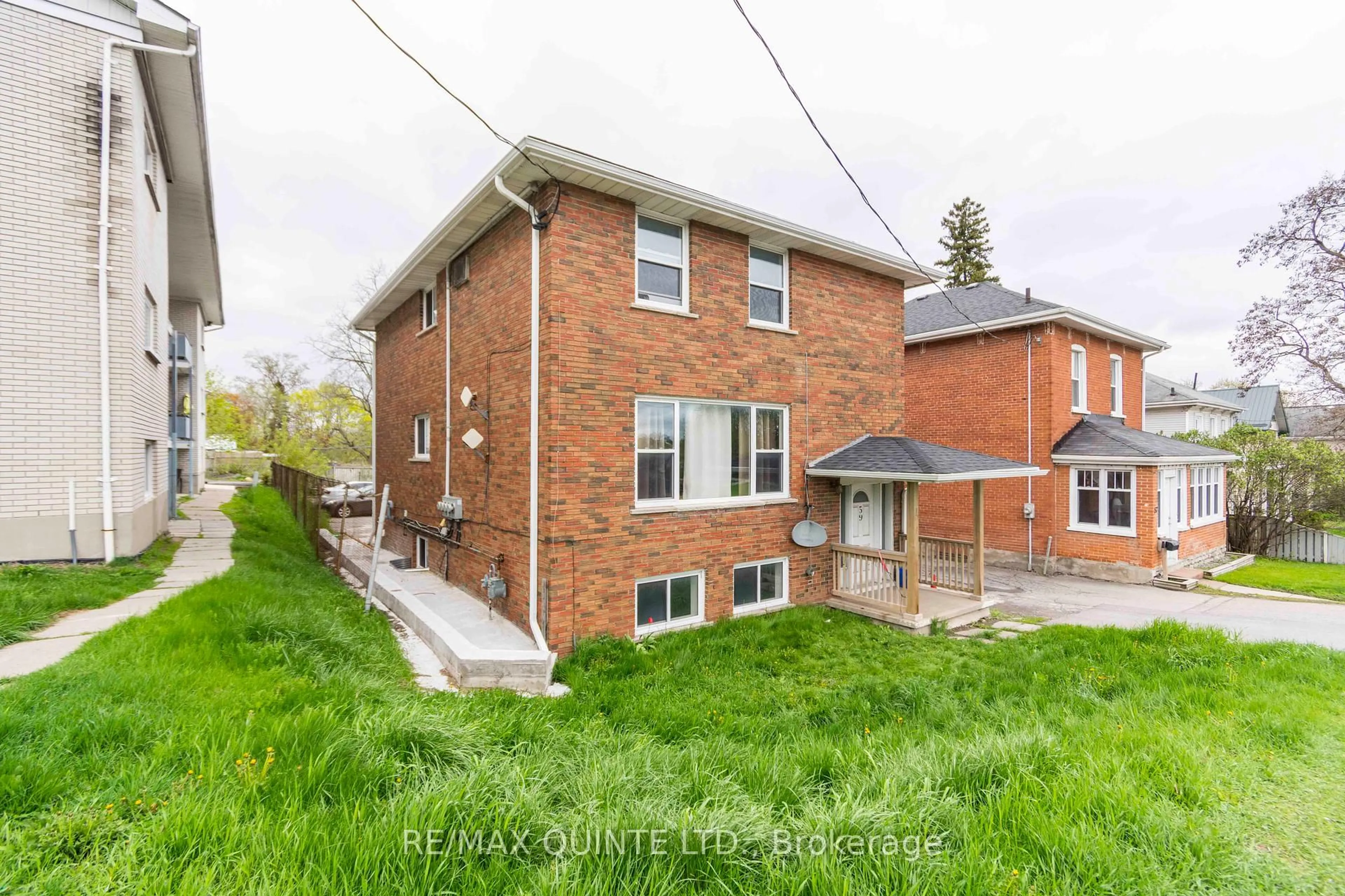 Home with brick exterior material, street for 59 North Front St, Belleville Ontario K8P 3B2