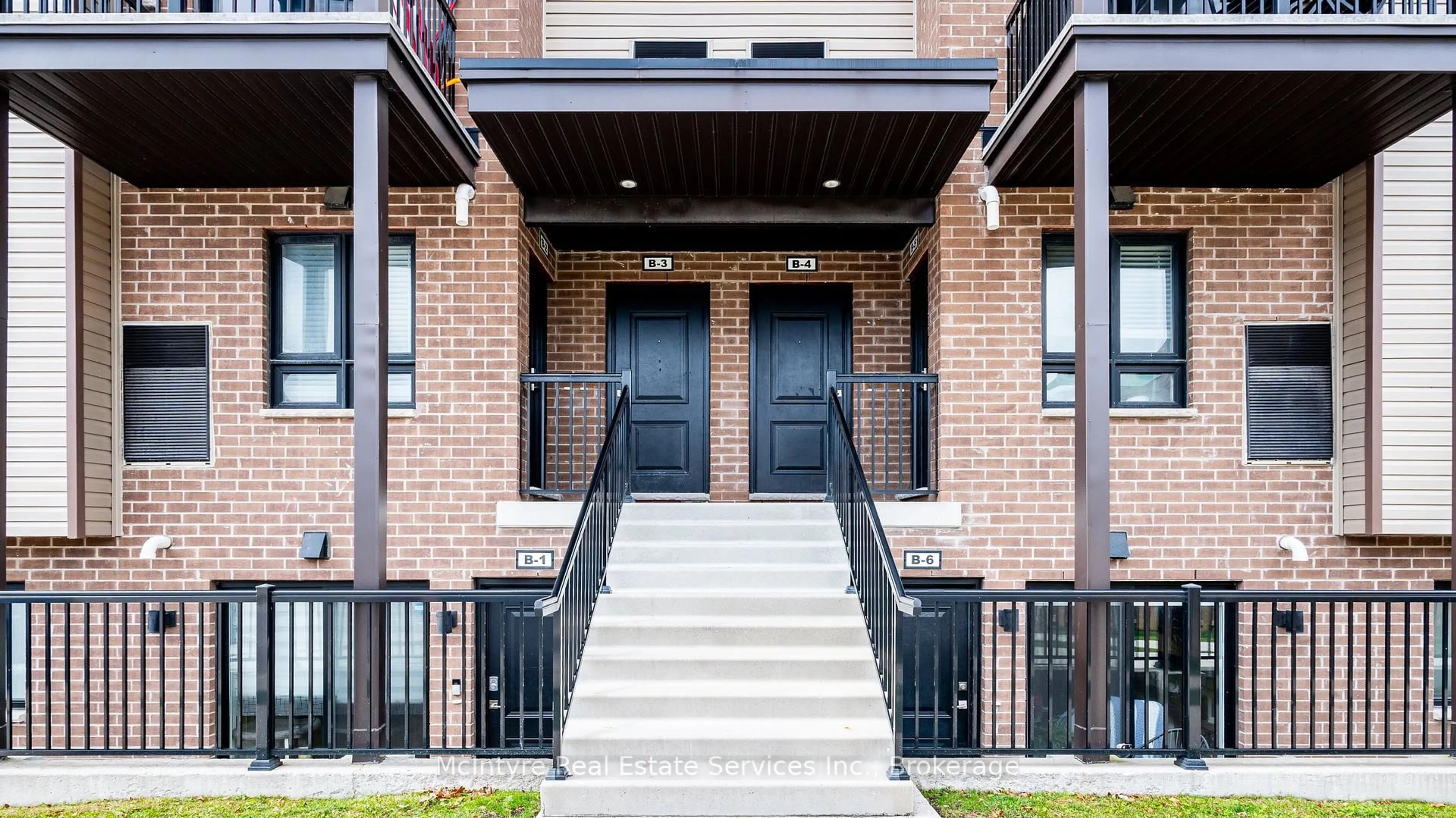 Home with brick exterior material, street for 1331 Countrystone Dr #B4, Kitchener Ontario N2N 3R9