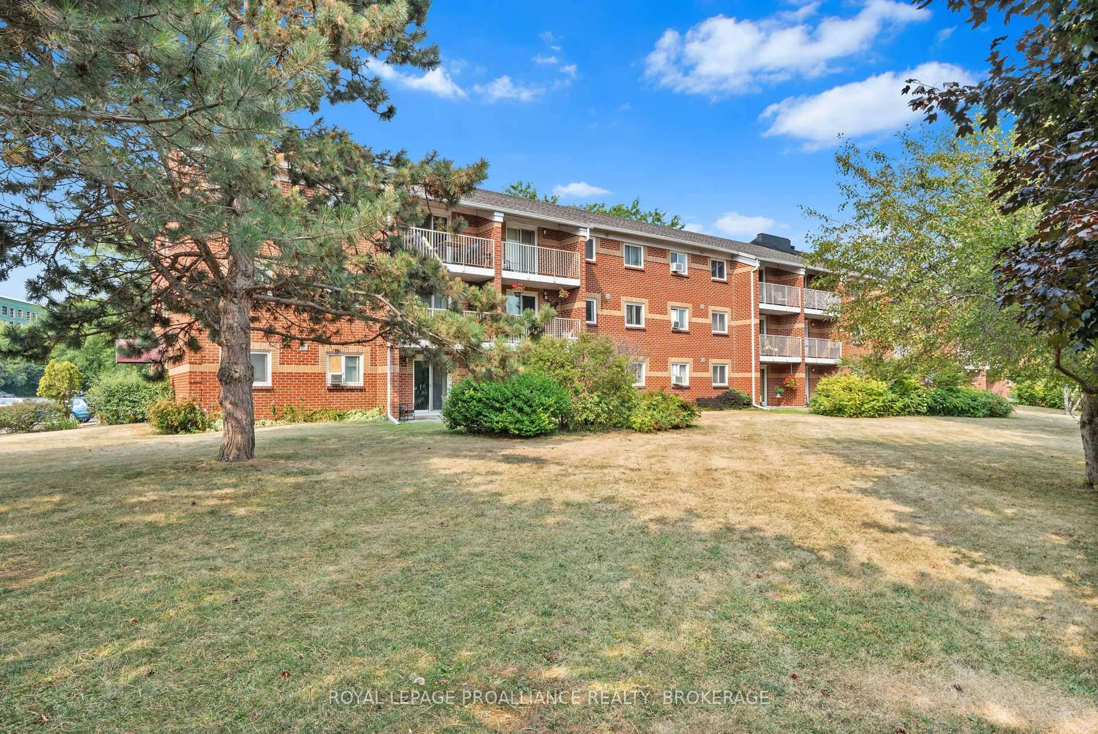 A pic from outside/outdoor area/front of a property/back of a property/a pic from drone, unknown for 573 Armstrong Rd #302, Kingston Ontario K7M 8J8
