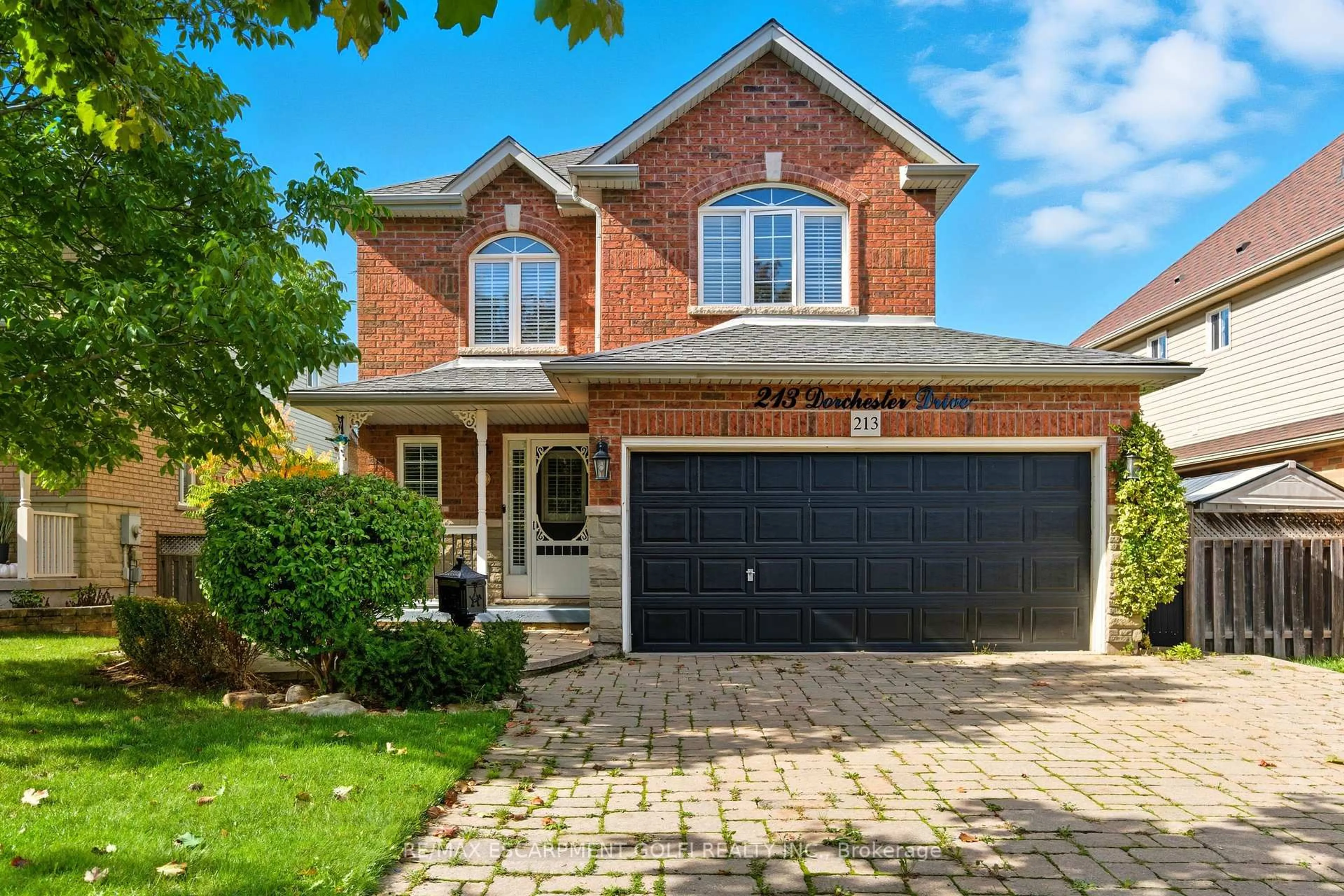 Home with brick exterior material, street for 213 Dorchester Dr, Grimsby Ontario L3M 5K8