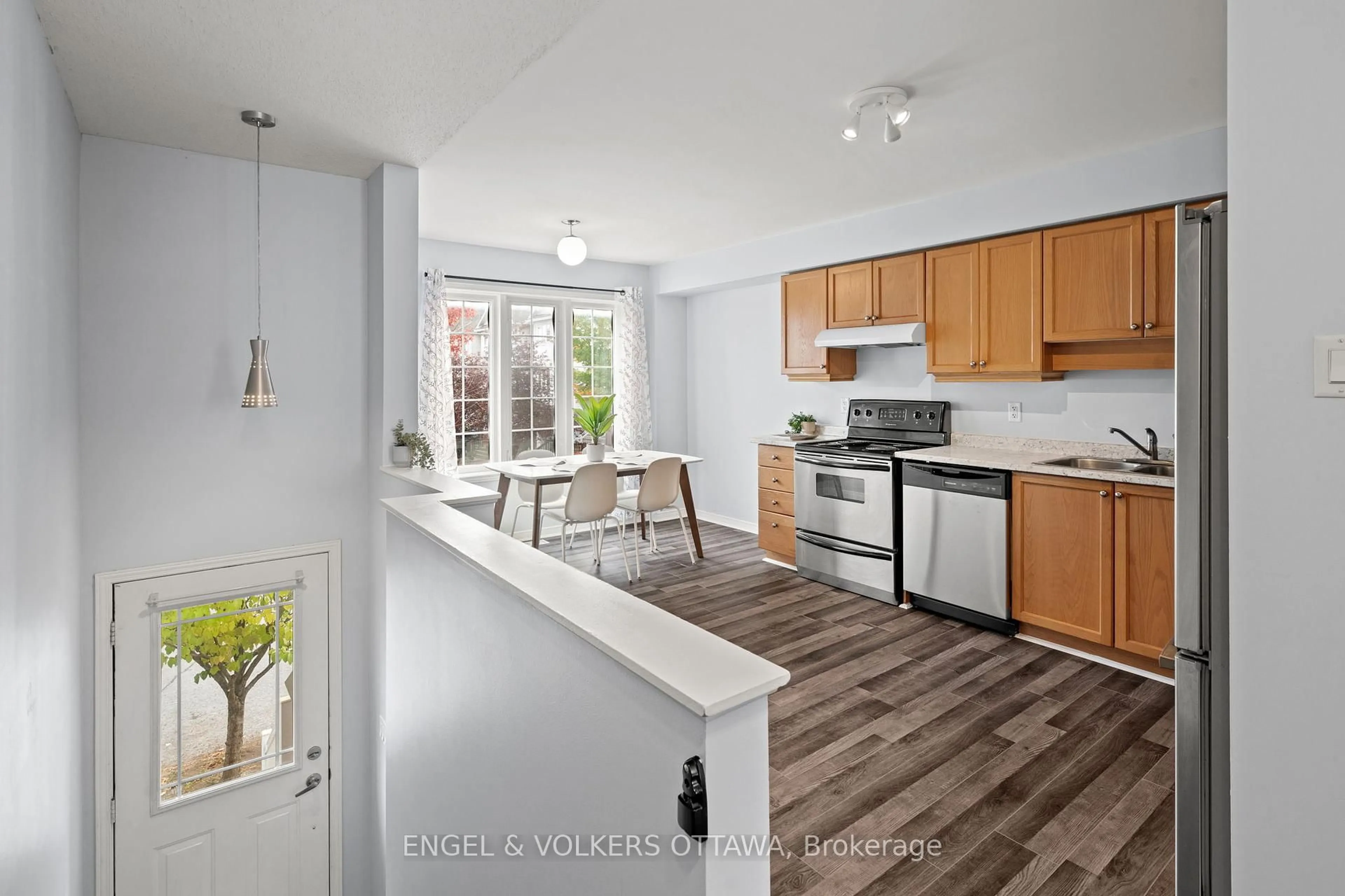 Open concept kitchen, ceramic/tile floor for 142 Wharhol Private, Ottawa Ontario K2H 1G5
