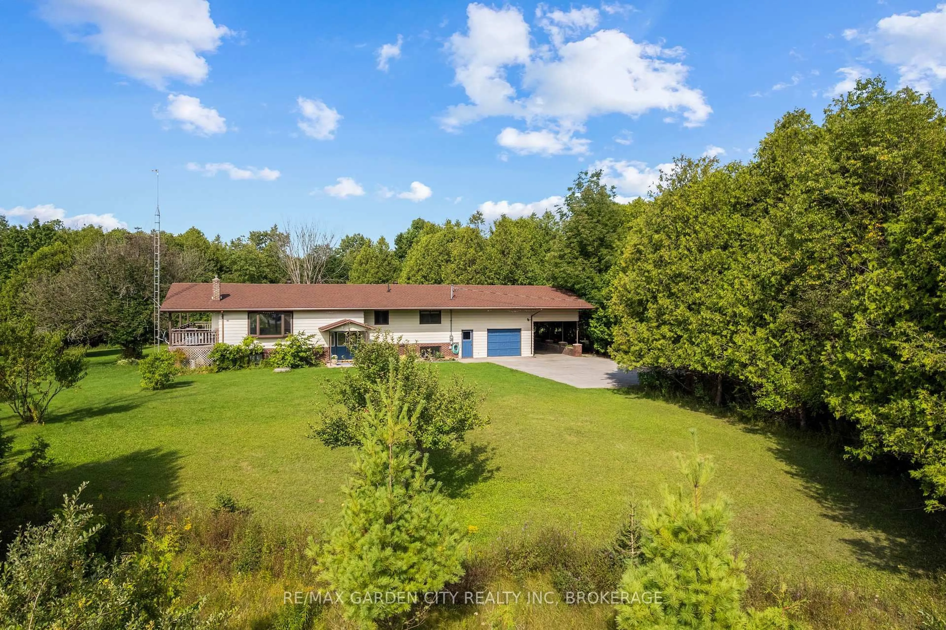 A pic from outside/outdoor area/front of a property/back of a property/a pic from drone, water/lake/river/ocean view for 317540 6&10 Highway, Georgian Bluffs Ontario N4K 5N6