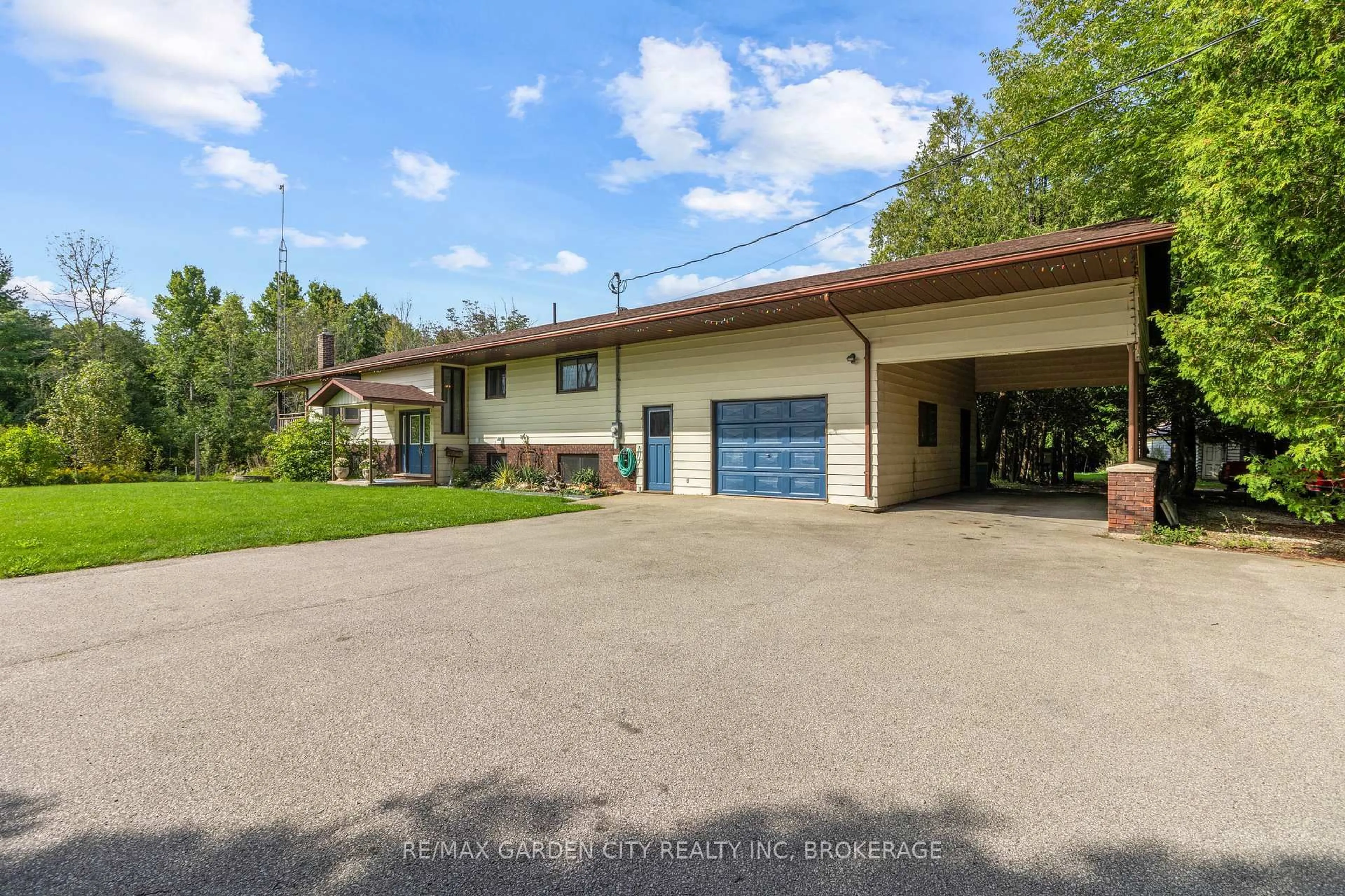 A pic from outside/outdoor area/front of a property/back of a property/a pic from drone, unknown for 317540 6&10 Highway, Georgian Bluffs Ontario N4K 5N6