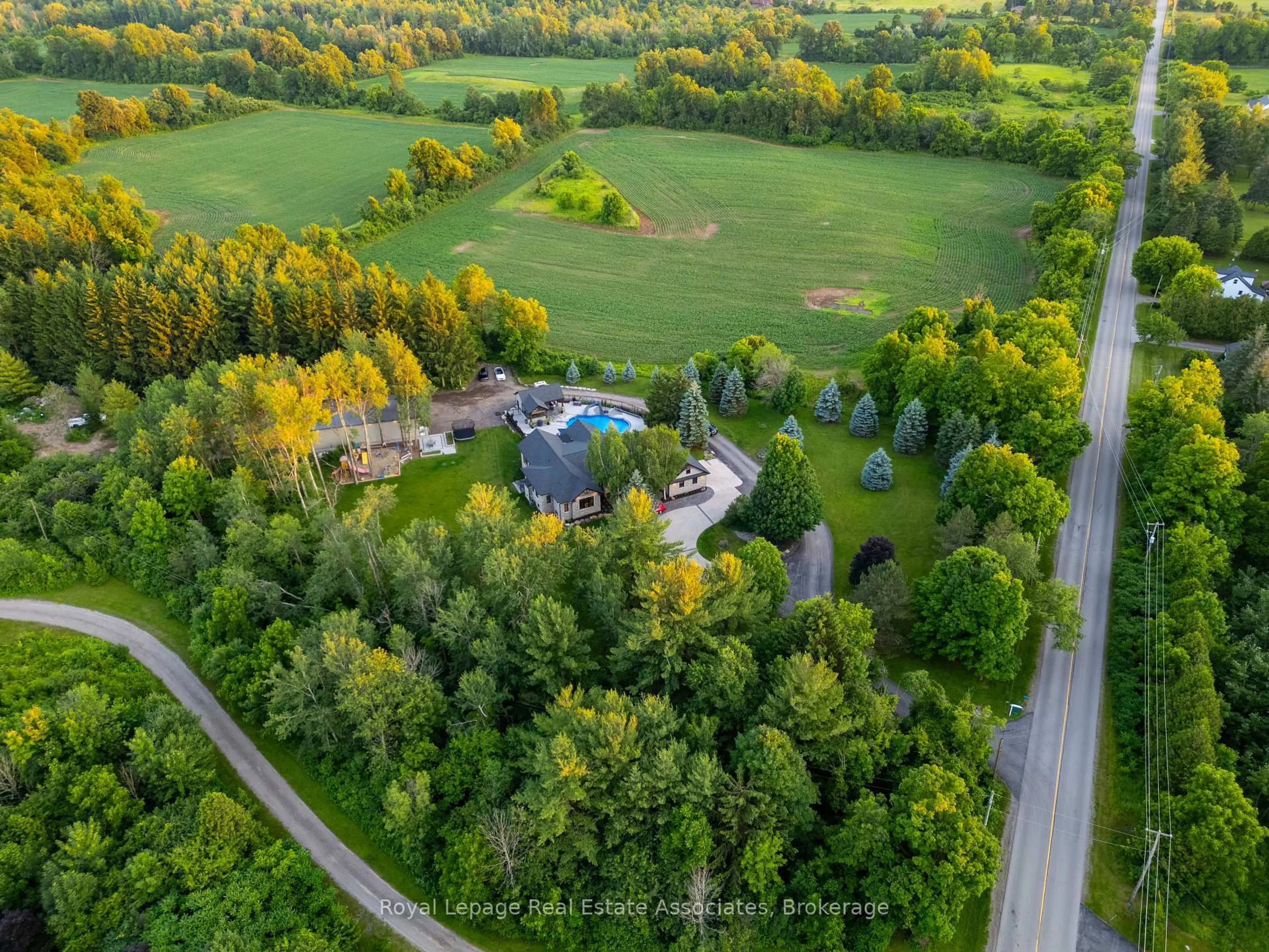 A pic from outside/outdoor area/front of a property/back of a property/a pic from drone, forest/trees view for 102 Concession 11, Hamilton Ontario L8B 1H8
