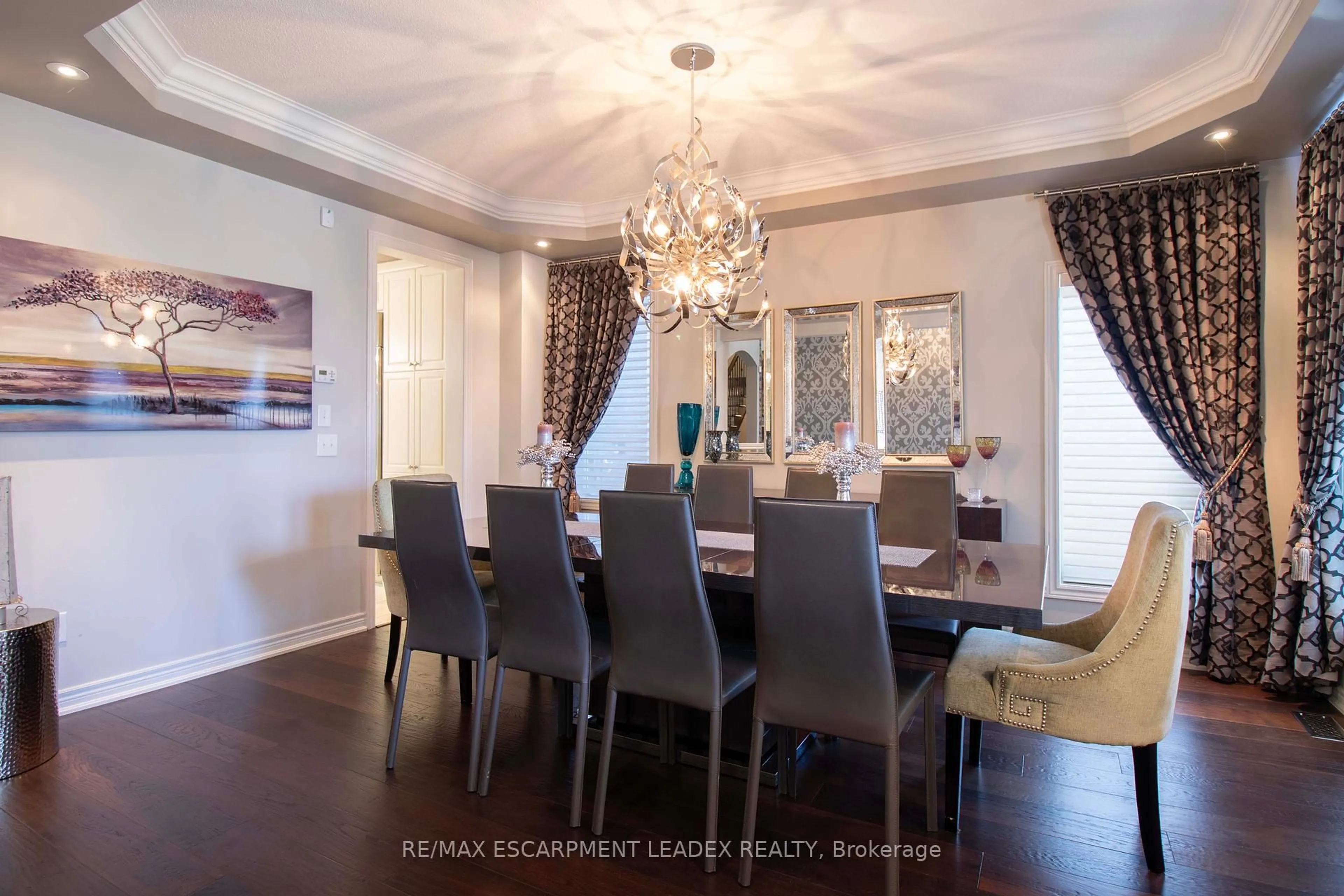 Dining room, wood/laminate floor for 80 Sutherland Cres, Hamilton Ontario L9K 0G9