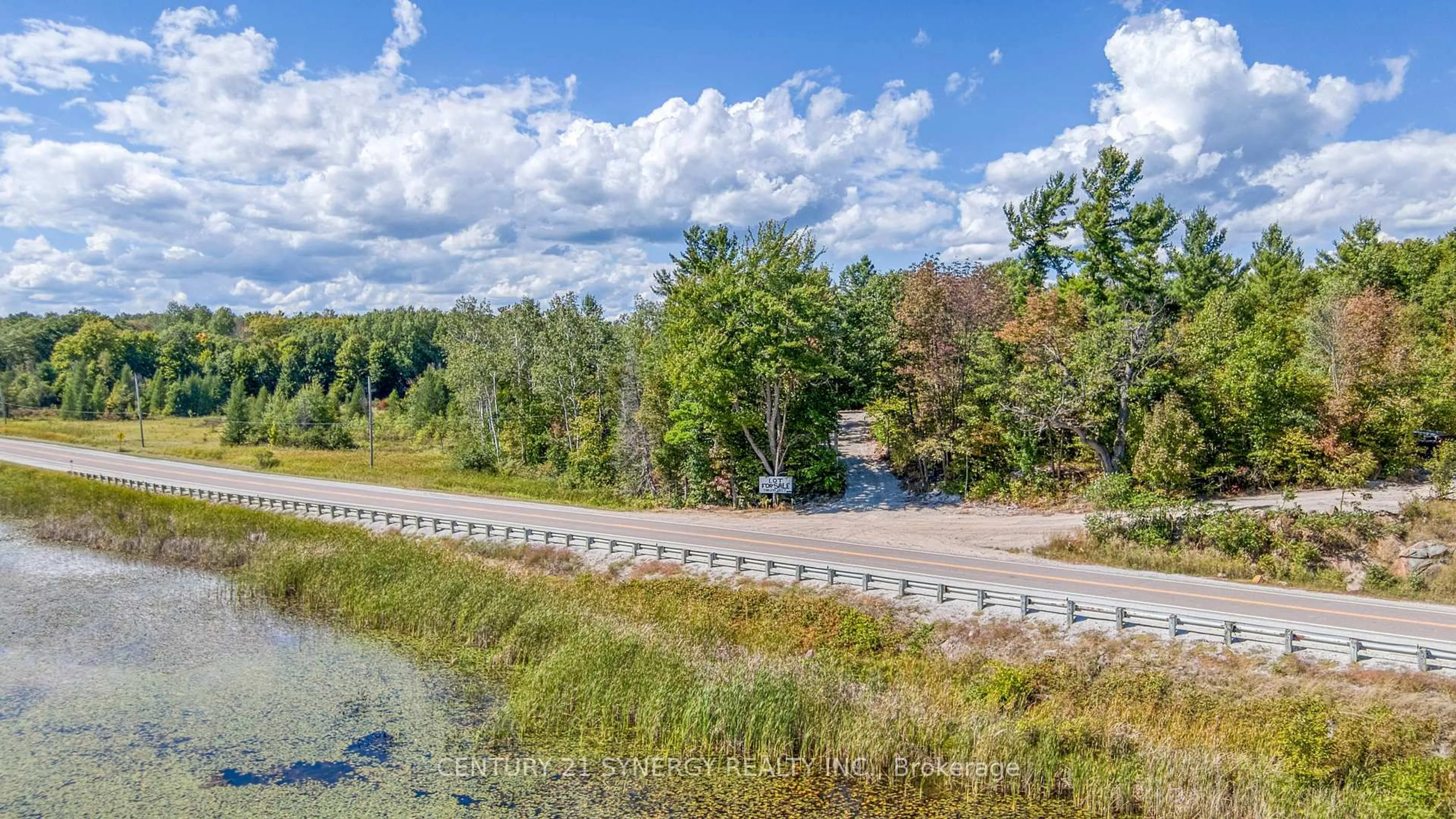 A pic from outside/outdoor area/front of a property/back of a property/a pic from drone, water/lake/river/ocean view for 21520 Highway 7 Highway, Maberly Ontario K0H 2B0