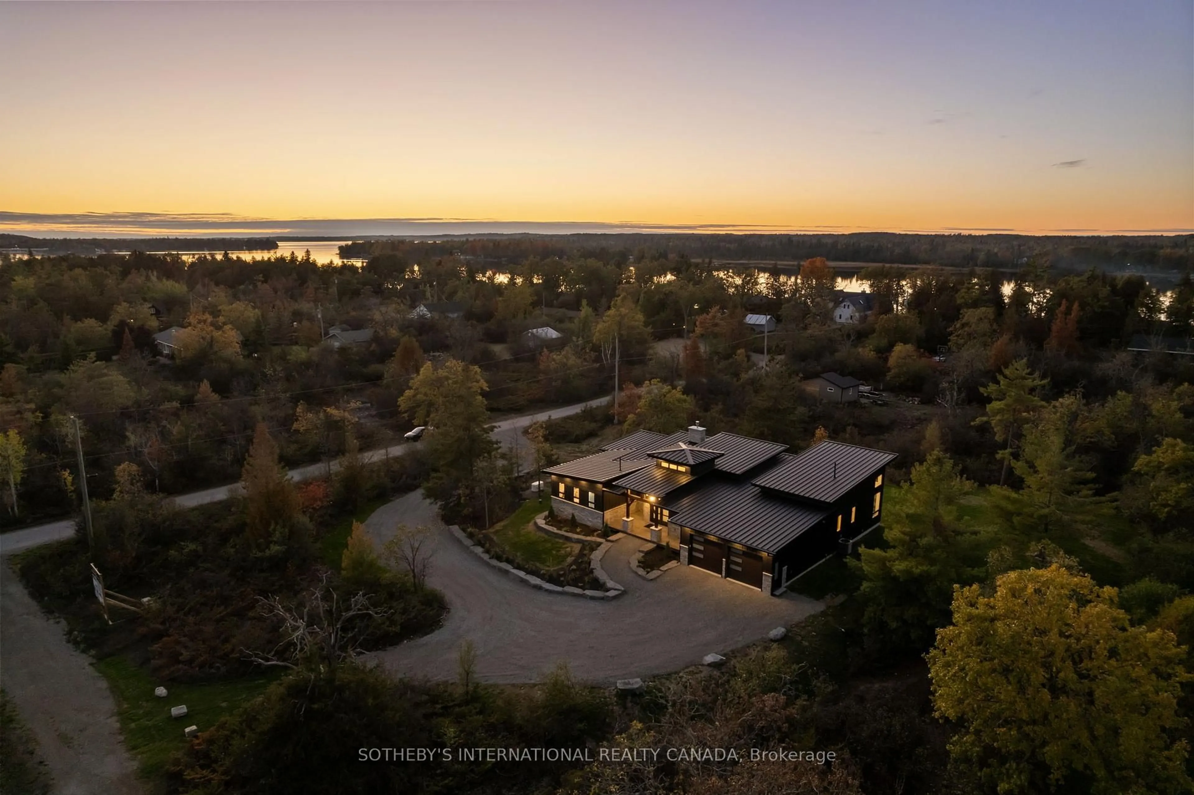 A pic from outside/outdoor area/front of a property/back of a property/a pic from drone, water/lake/river/ocean view for 5 Juniper Park St, Kawartha Lakes Ontario K0M 1A0