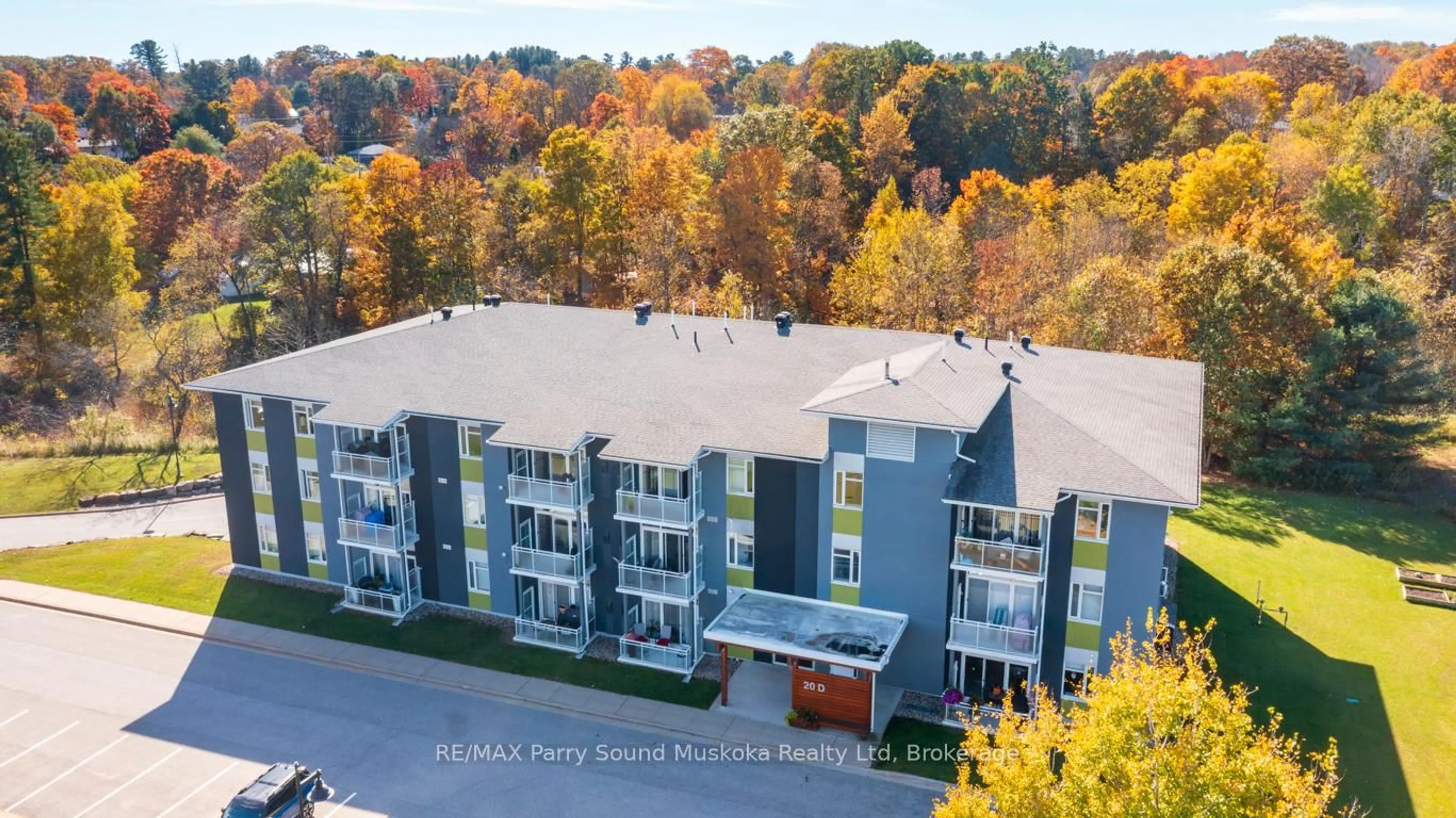A pic from outside/outdoor area/front of a property/back of a property/a pic from drone, unknown for 20D Silver Birch Crt #303, Parry Sound Ontario P2A 0A7