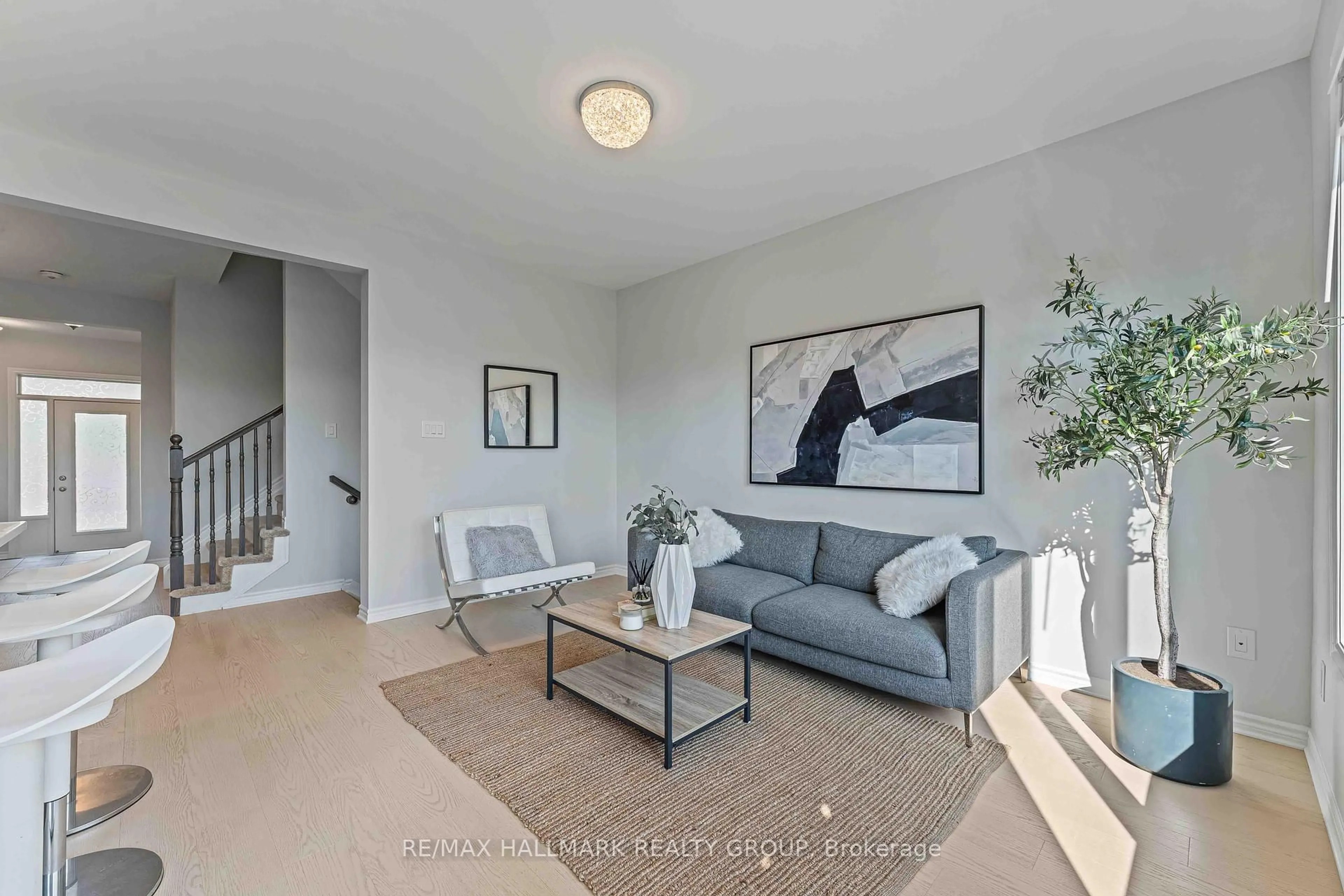 Living room with furniture, unknown for 402 Edgevalley Crt, Stittsville Ontario K2S 2R3