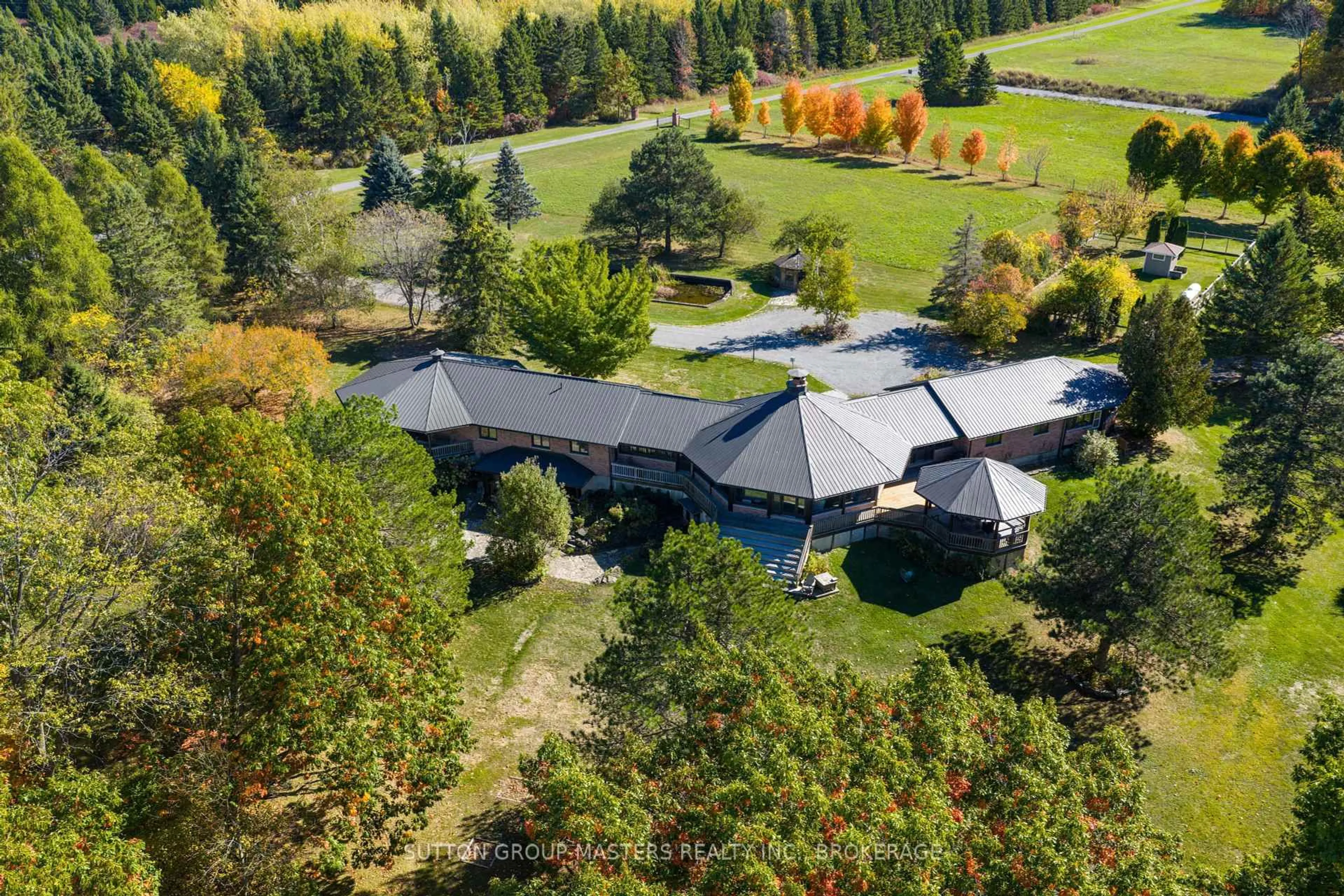A pic from outside/outdoor area/front of a property/back of a property/a pic from drone, mountain view for 314 Baseline Rd, Gananoque Ontario K7G 2V6