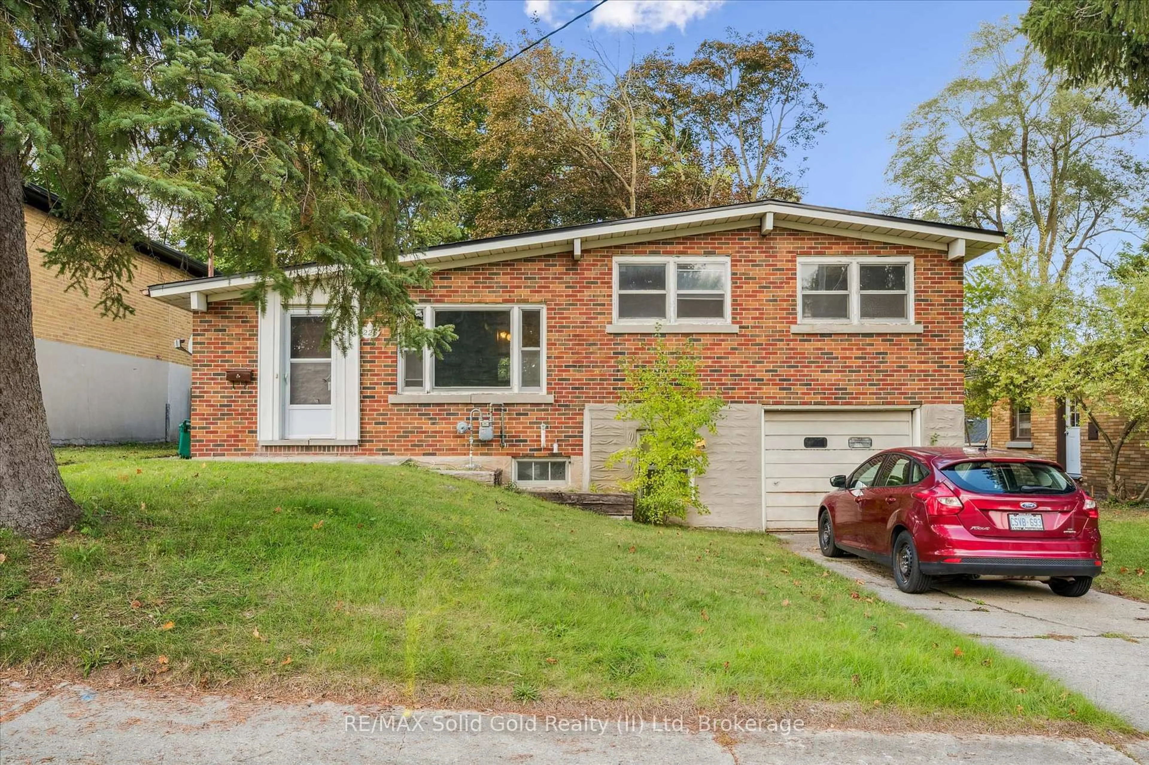 Home with brick exterior material, street for 226 Dick St, Waterloo Ontario N2L 1N4