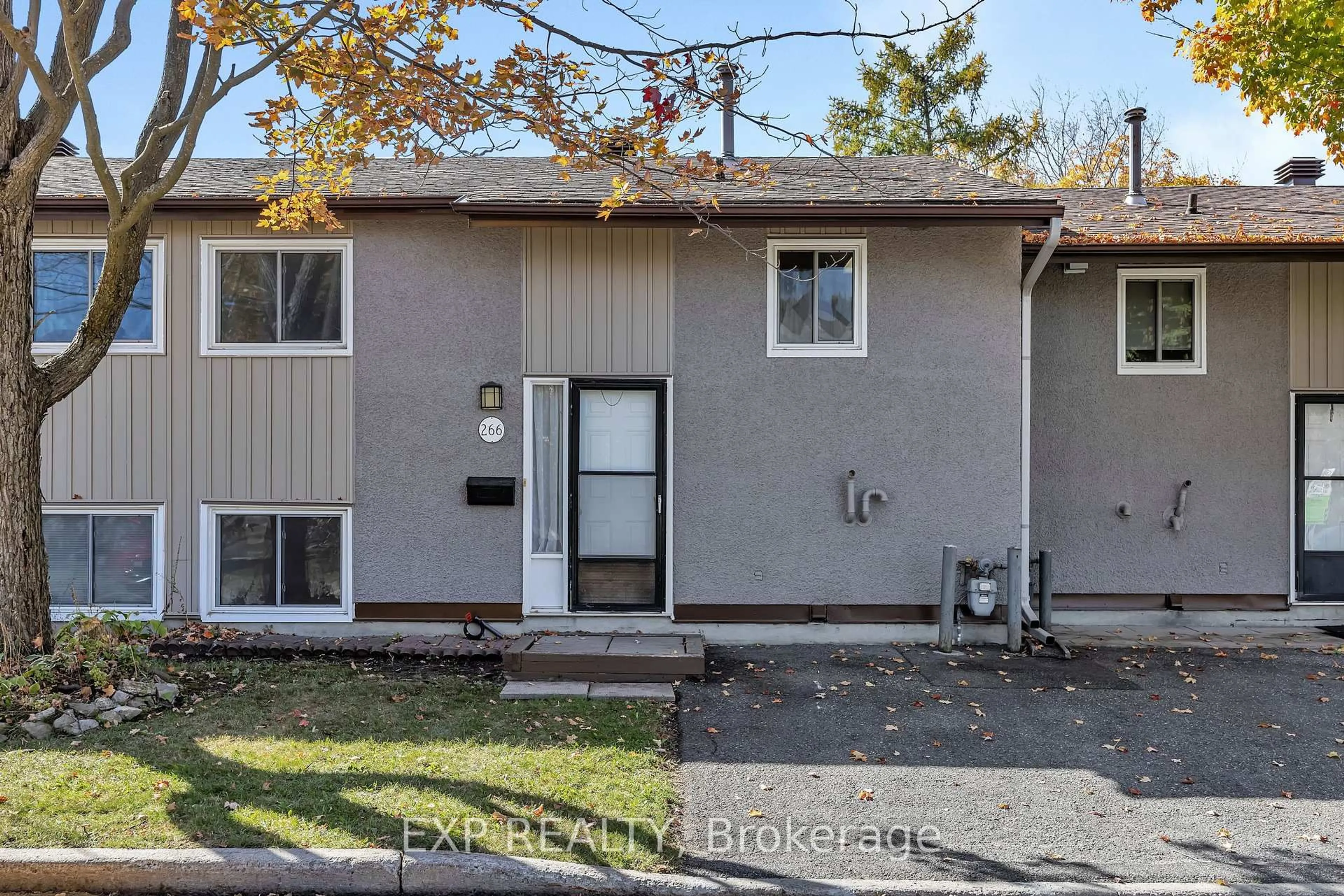 Home with vinyl exterior material, street for 266 Woodfield Dr, Ottawa Ontario K2G 3W9