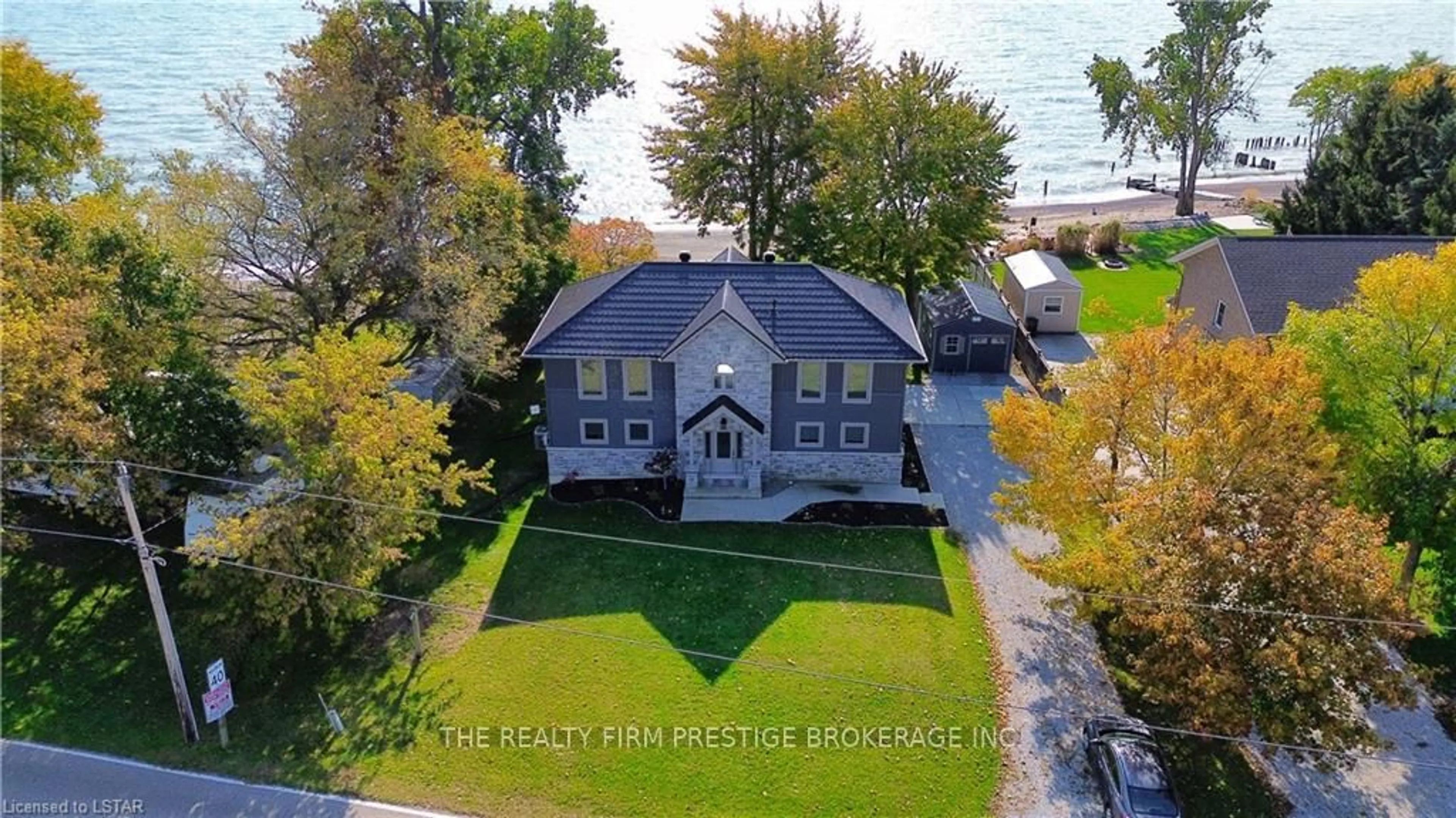 A pic from outside/outdoor area/front of a property/back of a property/a pic from drone, street for 18574 ERIE SHORE Dr, Chatham-Kent Ontario N0L 1A0