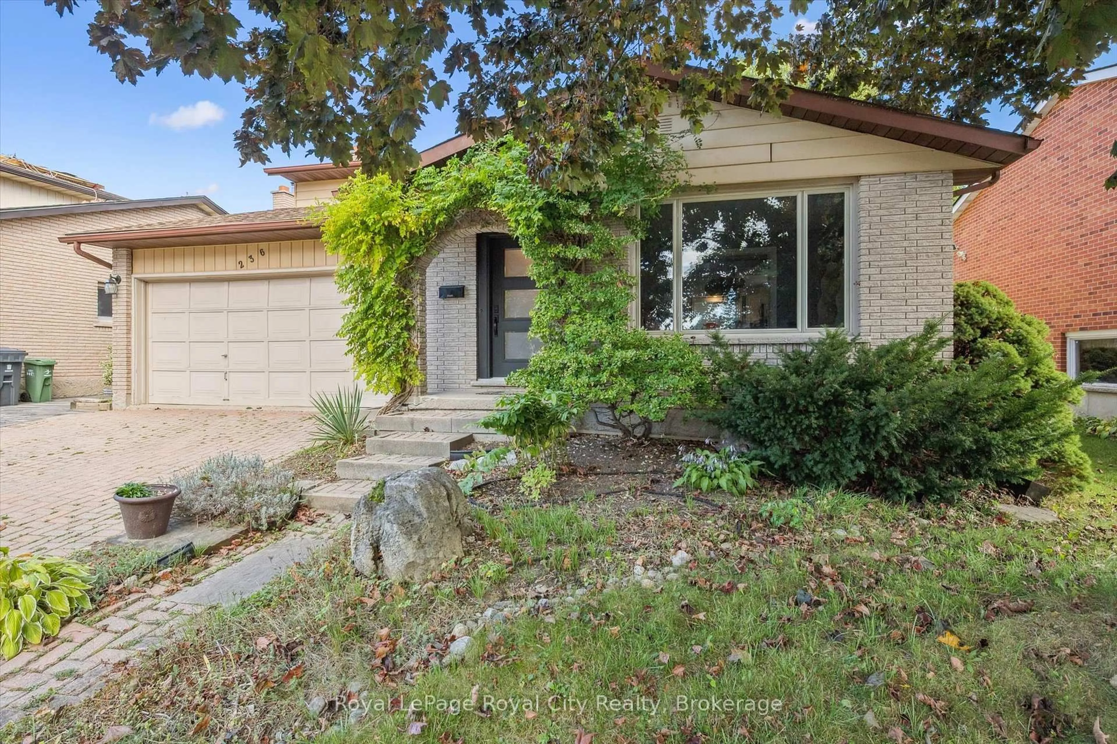 Home with brick exterior material, street for 236 IRONWOOD Rd, Guelph Ontario N1G 3G1