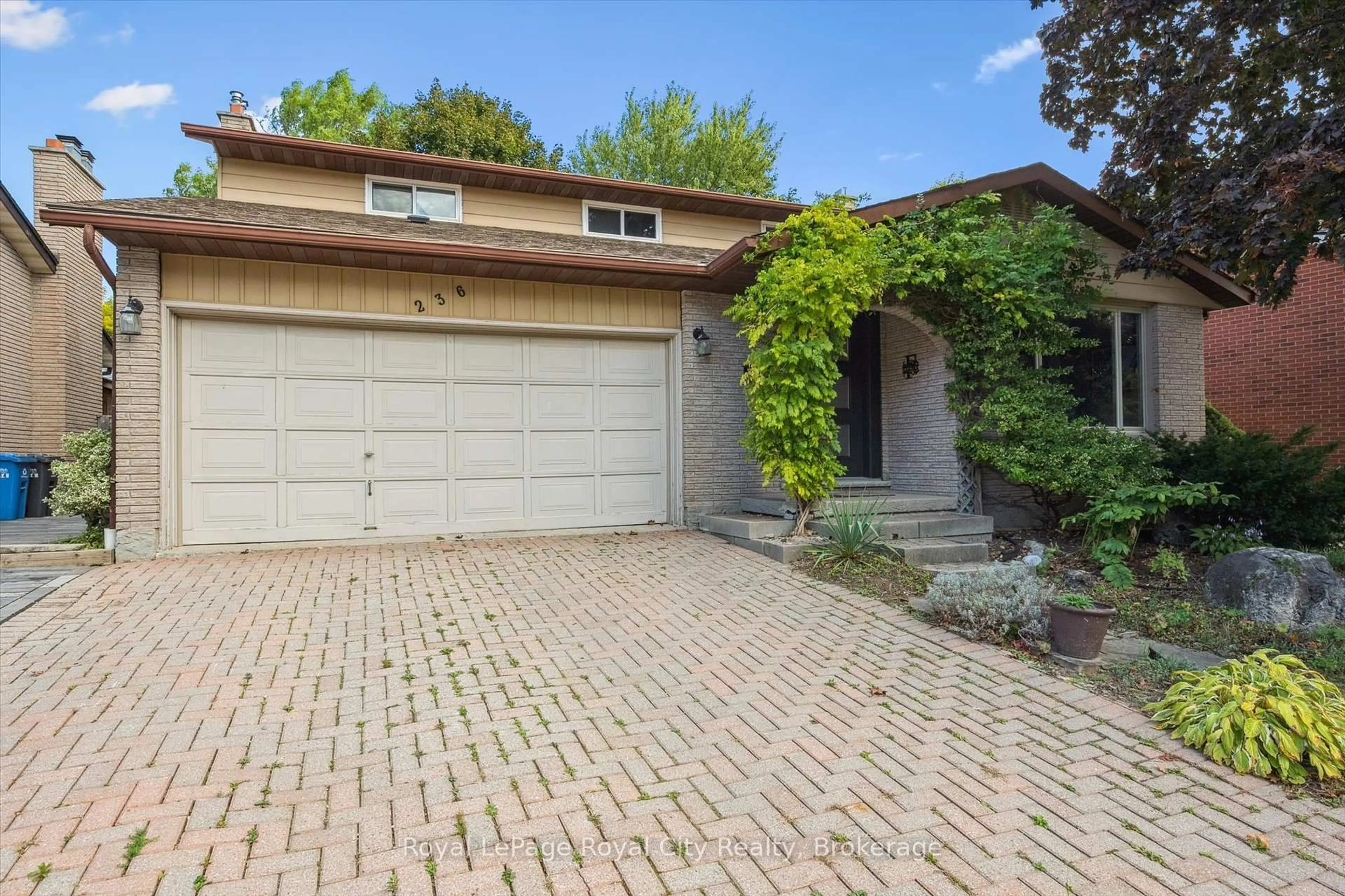 Home with brick exterior material, street for 236 IRONWOOD Rd, Guelph Ontario N1G 3G1