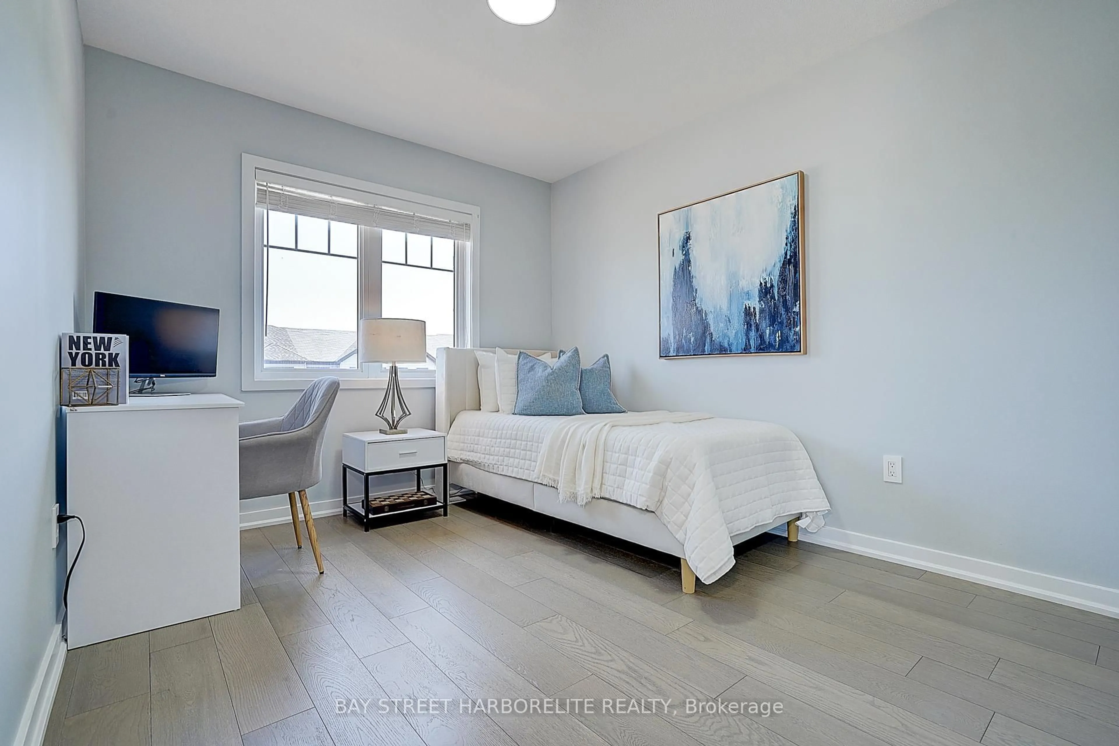 Bedroom with bed, wood/laminate floor for 1 Prestwick St, Hamilton Ontario L8J 0K7