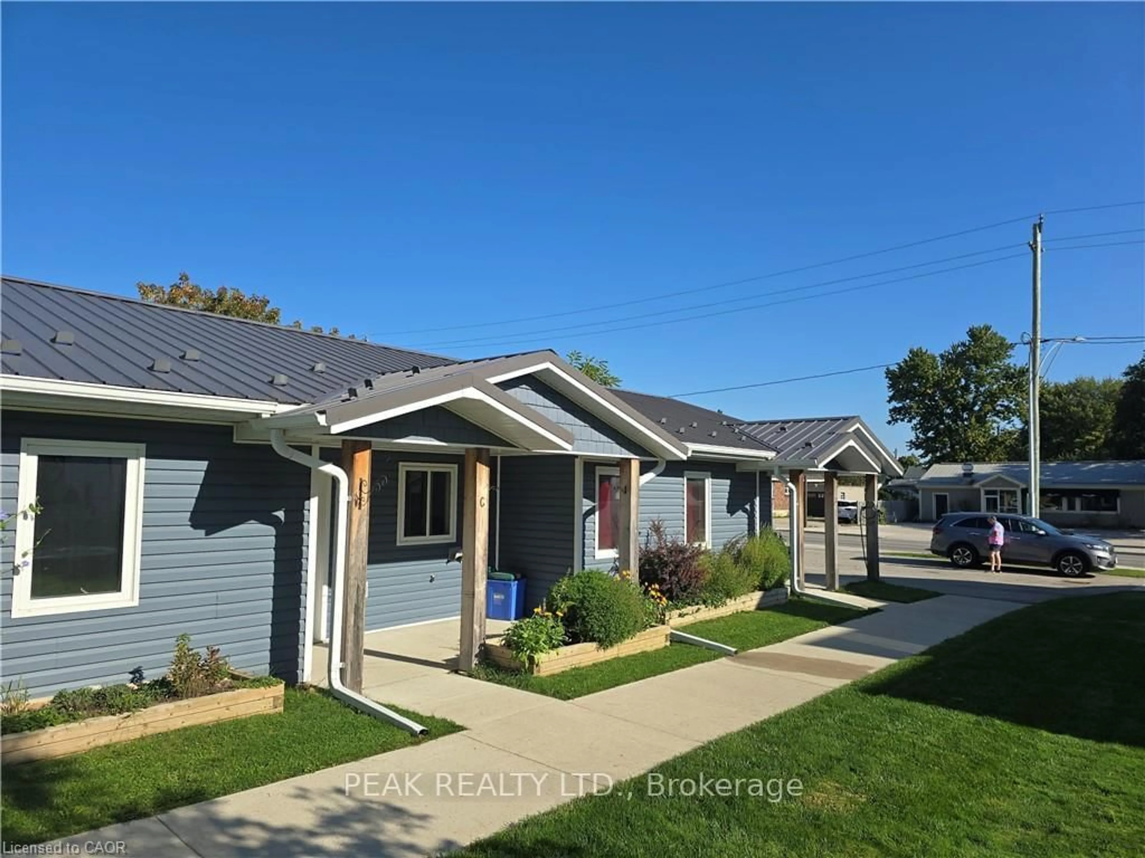 Home with vinyl exterior material, street for 46 Elora St, Minto Ontario L3Z 3E6