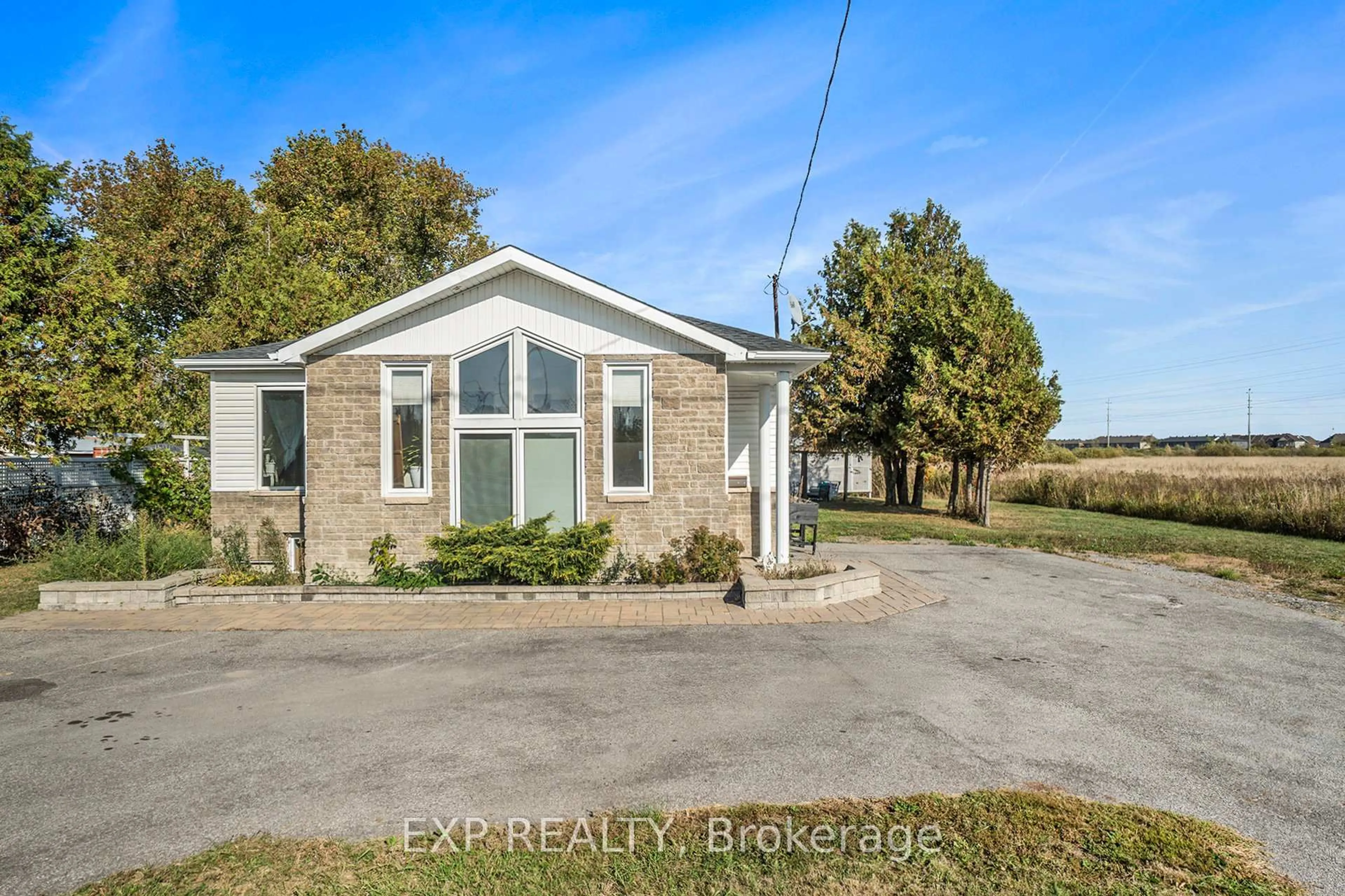 A pic from outside/outdoor area/front of a property/back of a property/a pic from drone, unknown for 2147 Mer Bleue Rd, Ottawa Ontario K4A 3T9