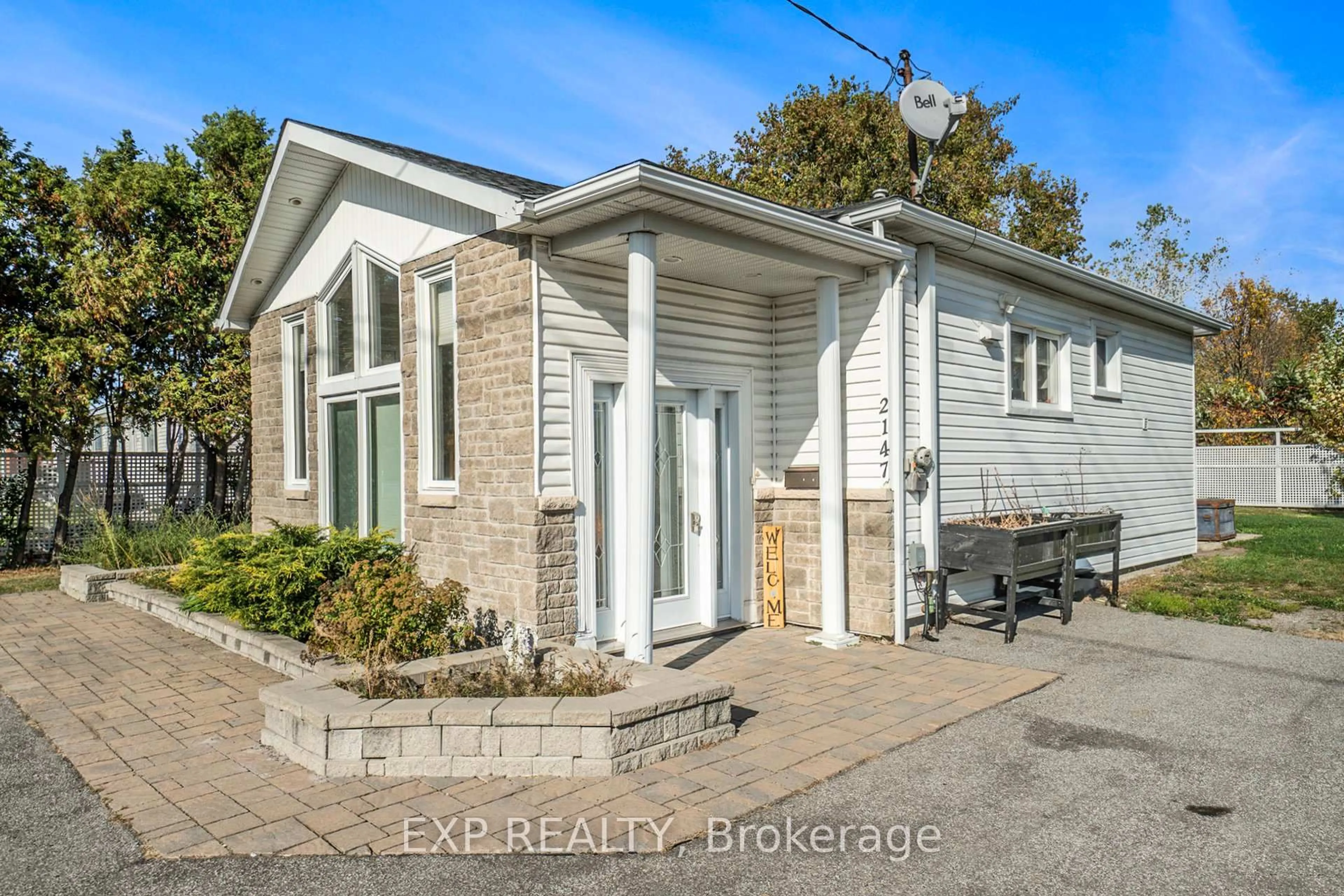 A pic from outside/outdoor area/front of a property/back of a property/a pic from drone, street for 2147 Mer Bleue Rd, Ottawa Ontario K4A 3T9