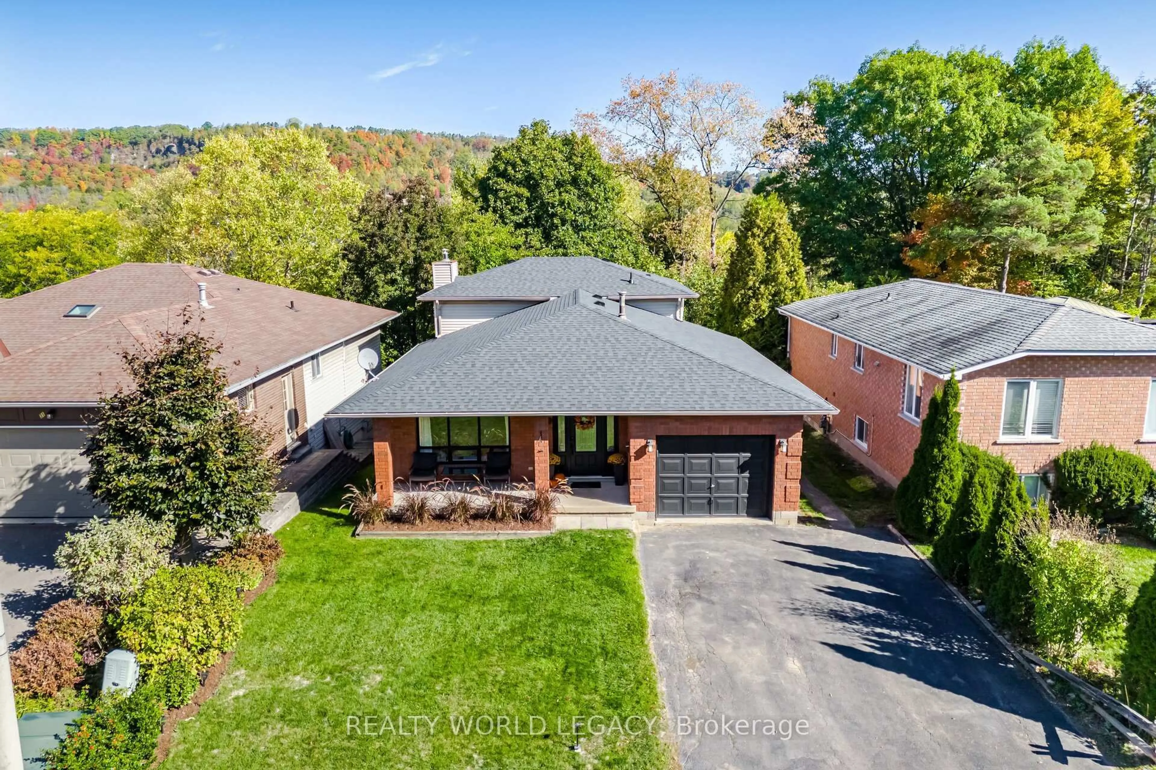 Home with brick exterior material, street for 33 Morton Ave, Hamilton Ontario L9H 6W6