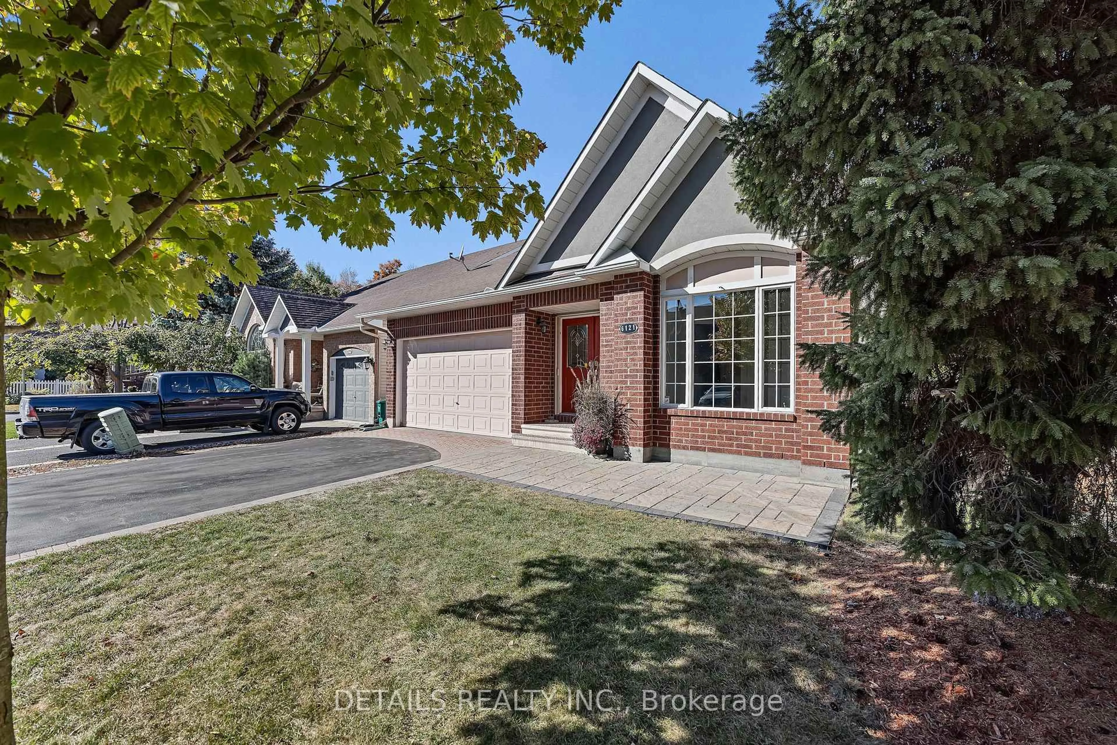 Home with brick exterior material, street for 6121 Bristlecone Way, Ottawa Ontario K1W 1H8