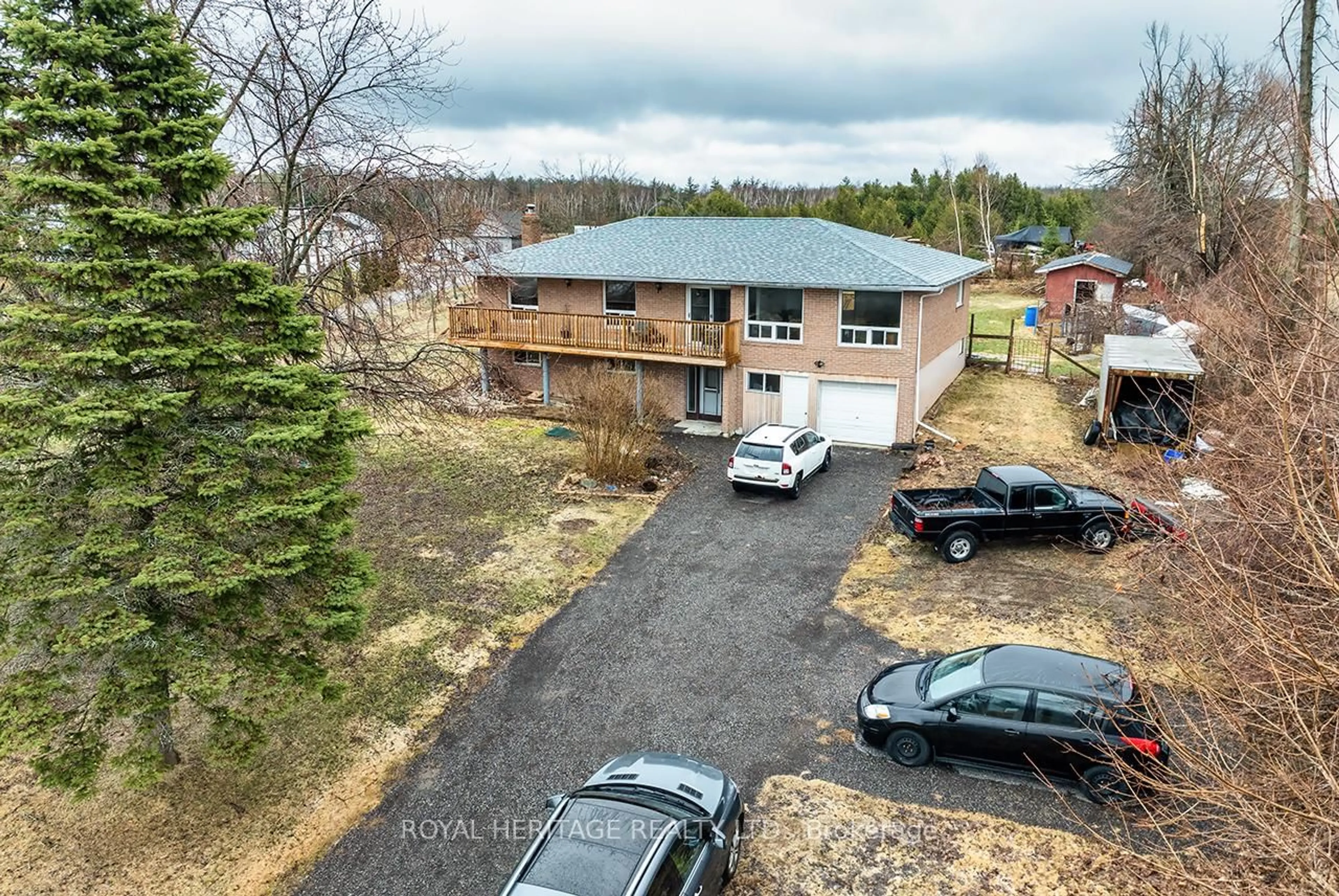 A pic from outside/outdoor area/front of a property/back of a property/a pic from drone, street for 940 Portage Rd, Kawartha Lakes Ontario K0M 2B0