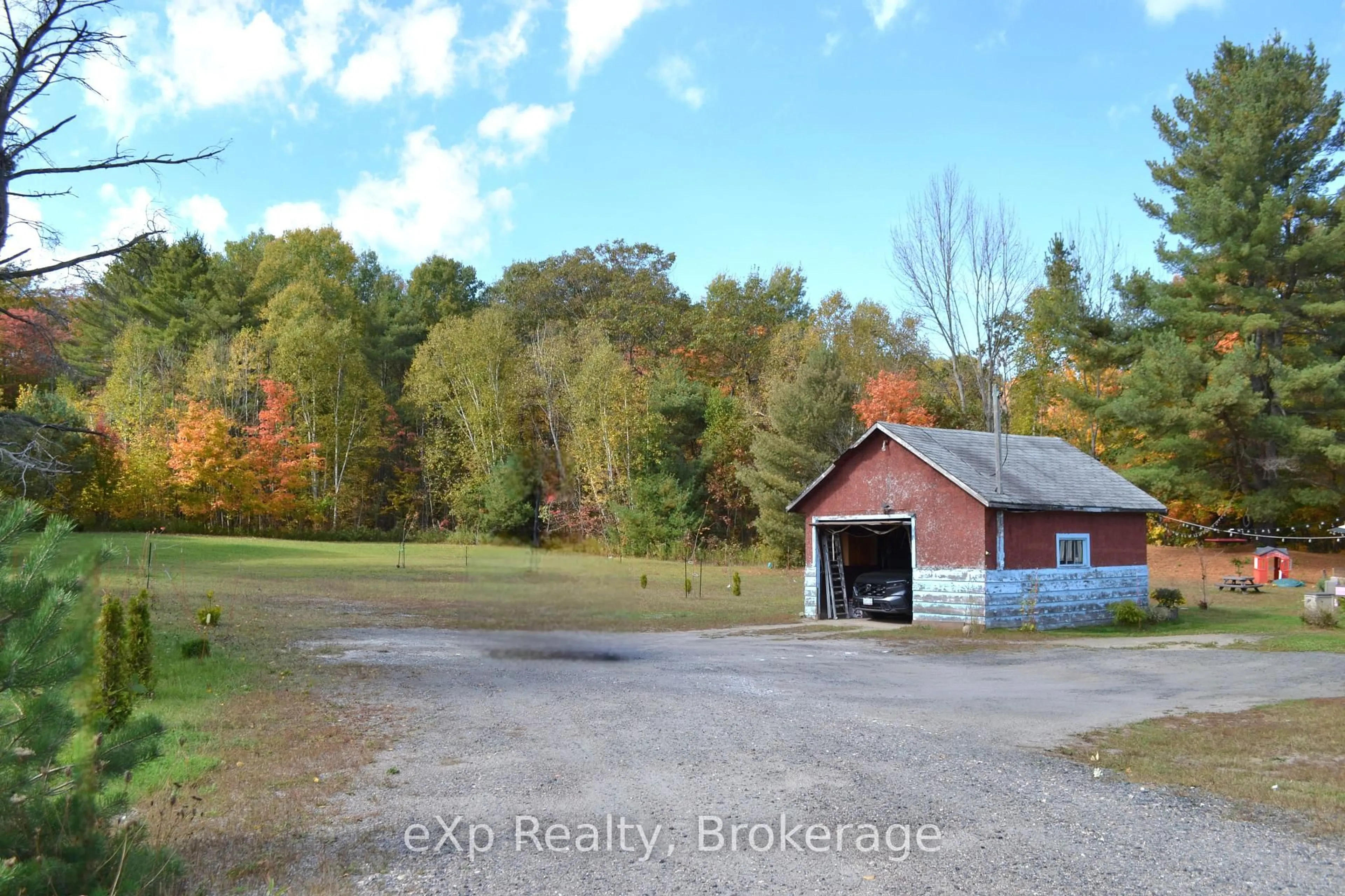 A pic from outside/outdoor area/front of a property/back of a property/a pic from drone, water/lake/river/ocean view for 62 Highway 124, McDougall Ontario P2A 2W9