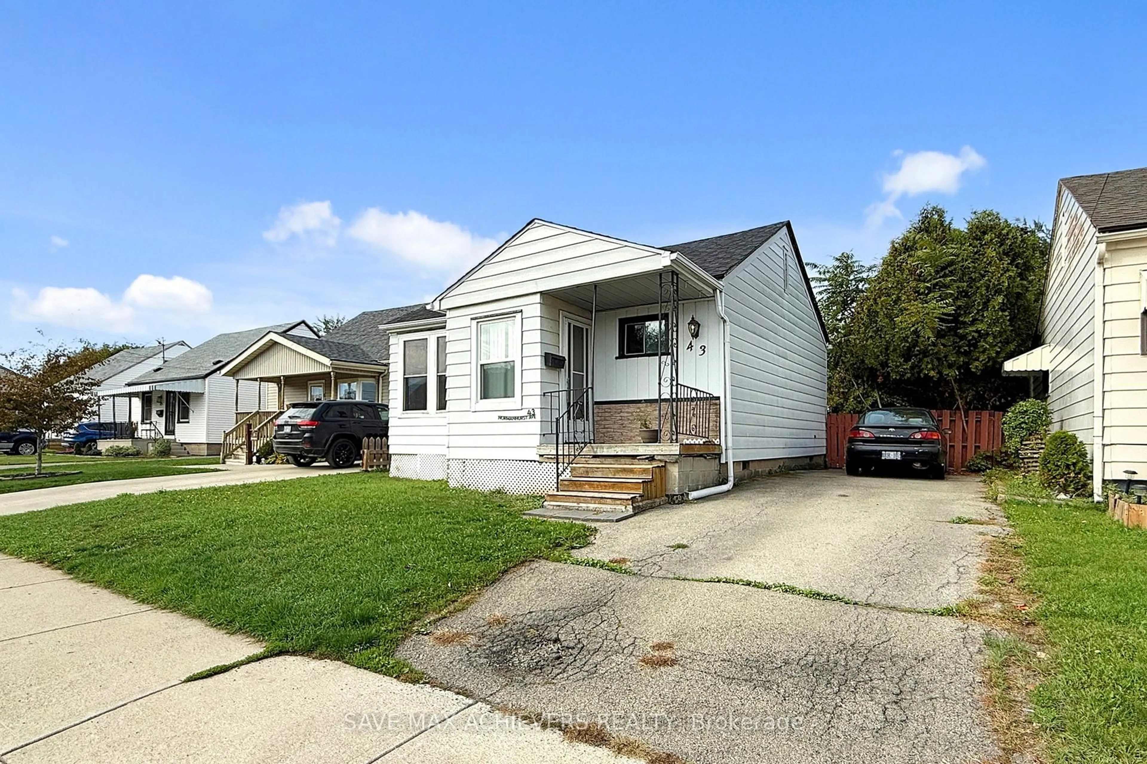Home with vinyl exterior material, street for 43 Normanhurst Ave, Hamilton Ontario L8H 5M3