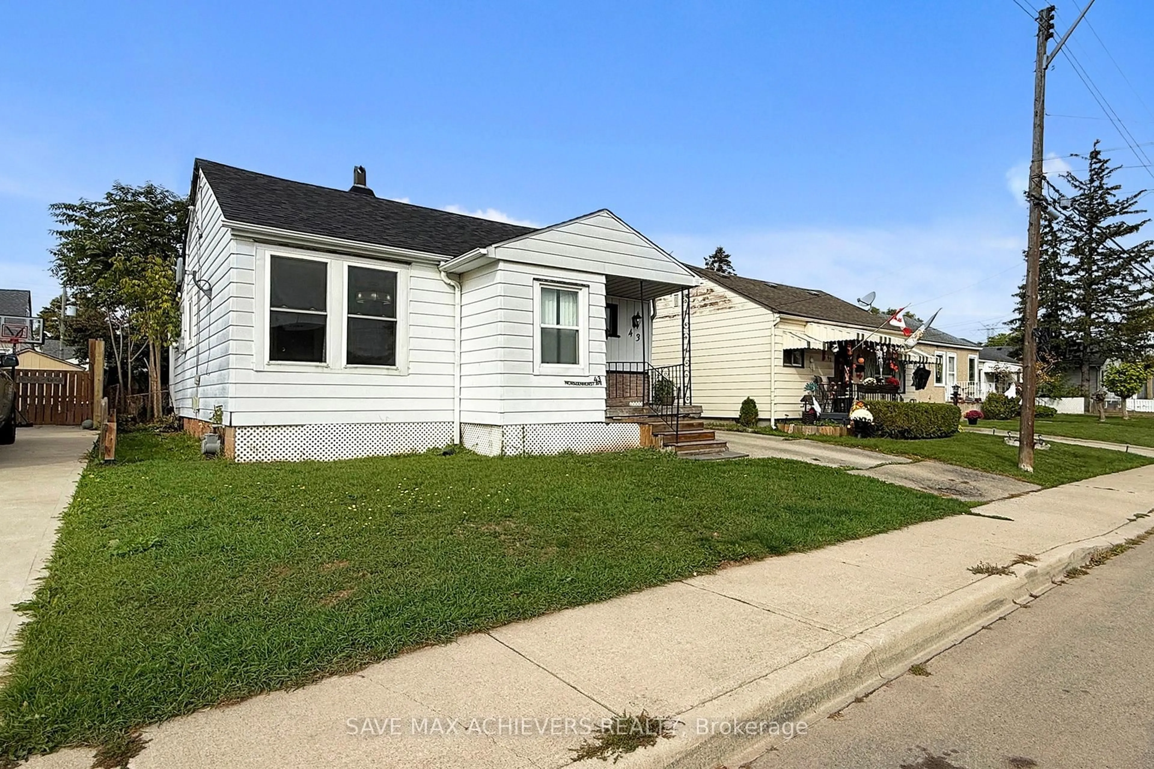 Home with vinyl exterior material, street for 43 Normanhurst Ave, Hamilton Ontario L8H 5M3