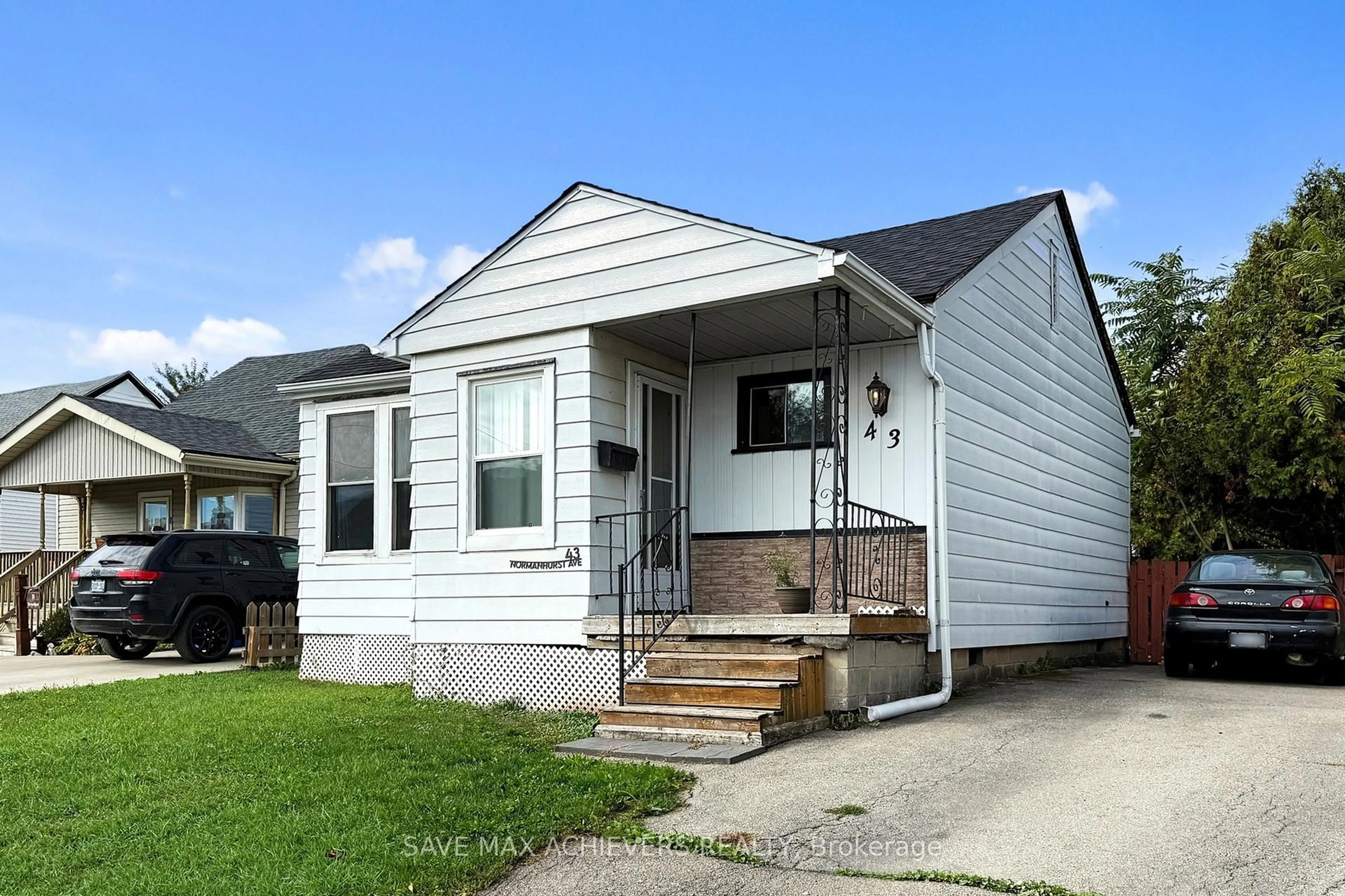 Home with vinyl exterior material, street for 43 Normanhurst Ave, Hamilton Ontario L8H 5M3
