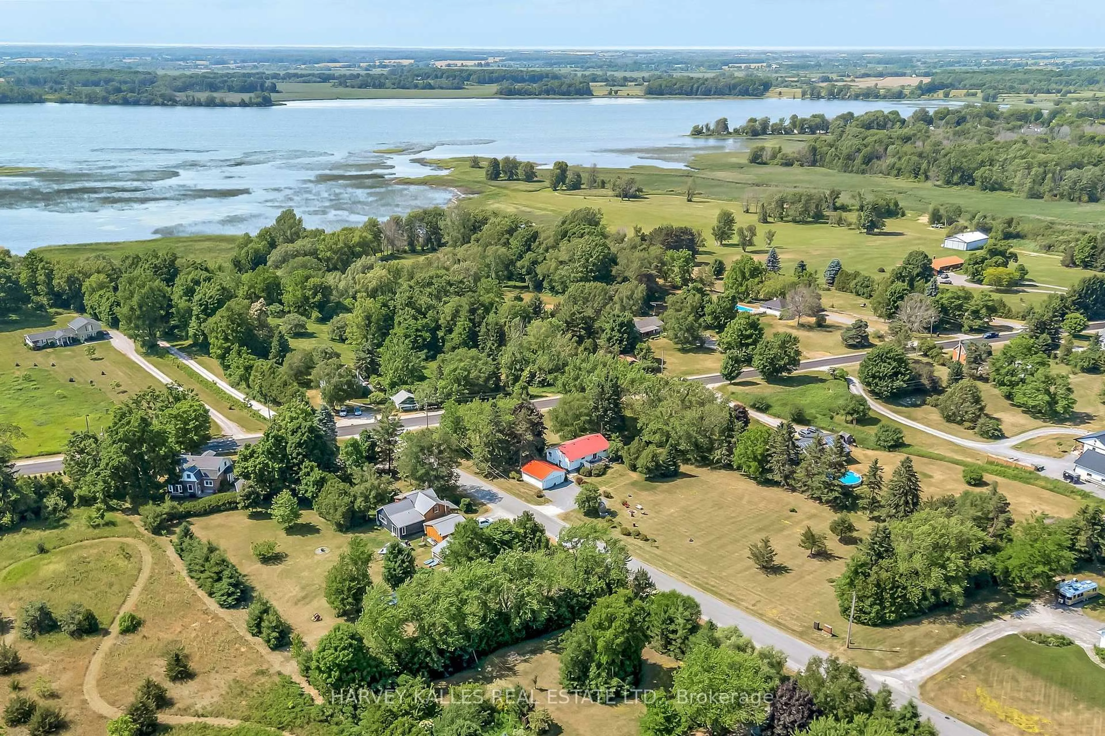 A pic from outside/outdoor area/front of a property/back of a property/a pic from drone, water/lake/river/ocean view for 17 Kleinsteuber Park Rd, Prince Edward County Ontario K0K 2T0
