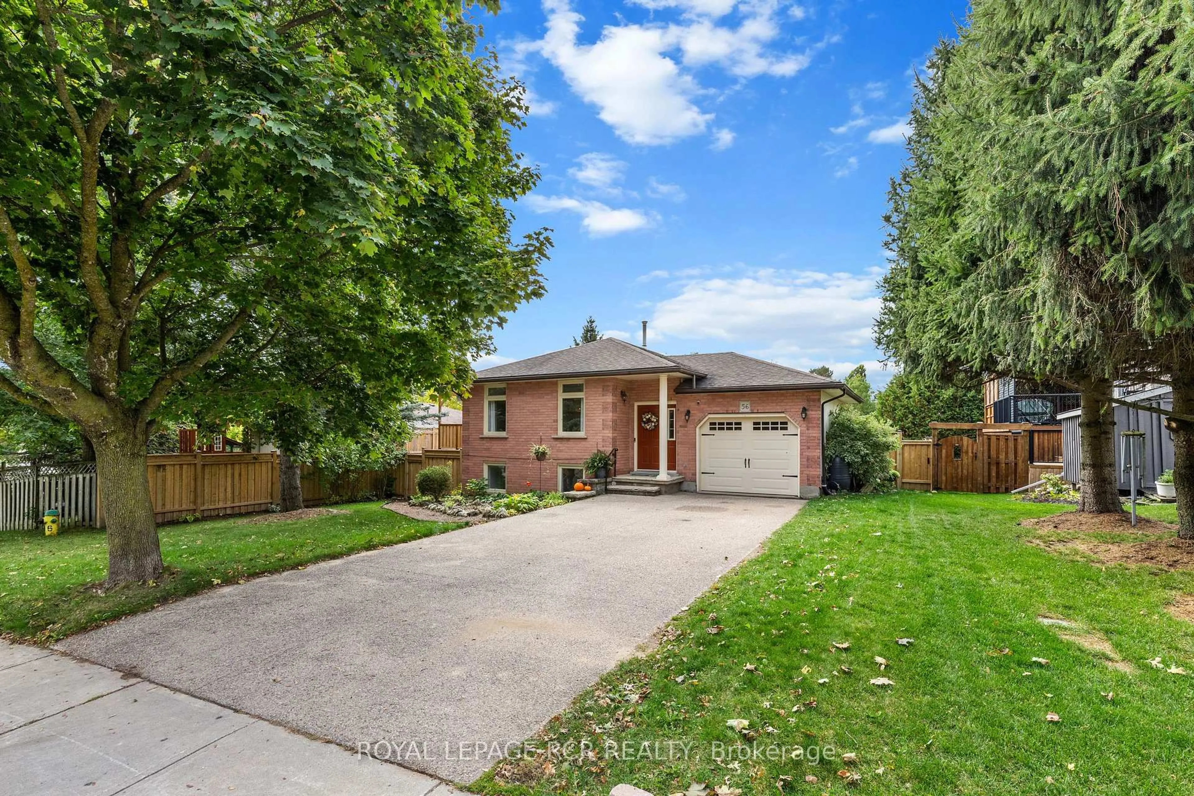 Home with brick exterior material, street for 56 WILSON Cres, Centre Wellington Ontario N0B 1S0