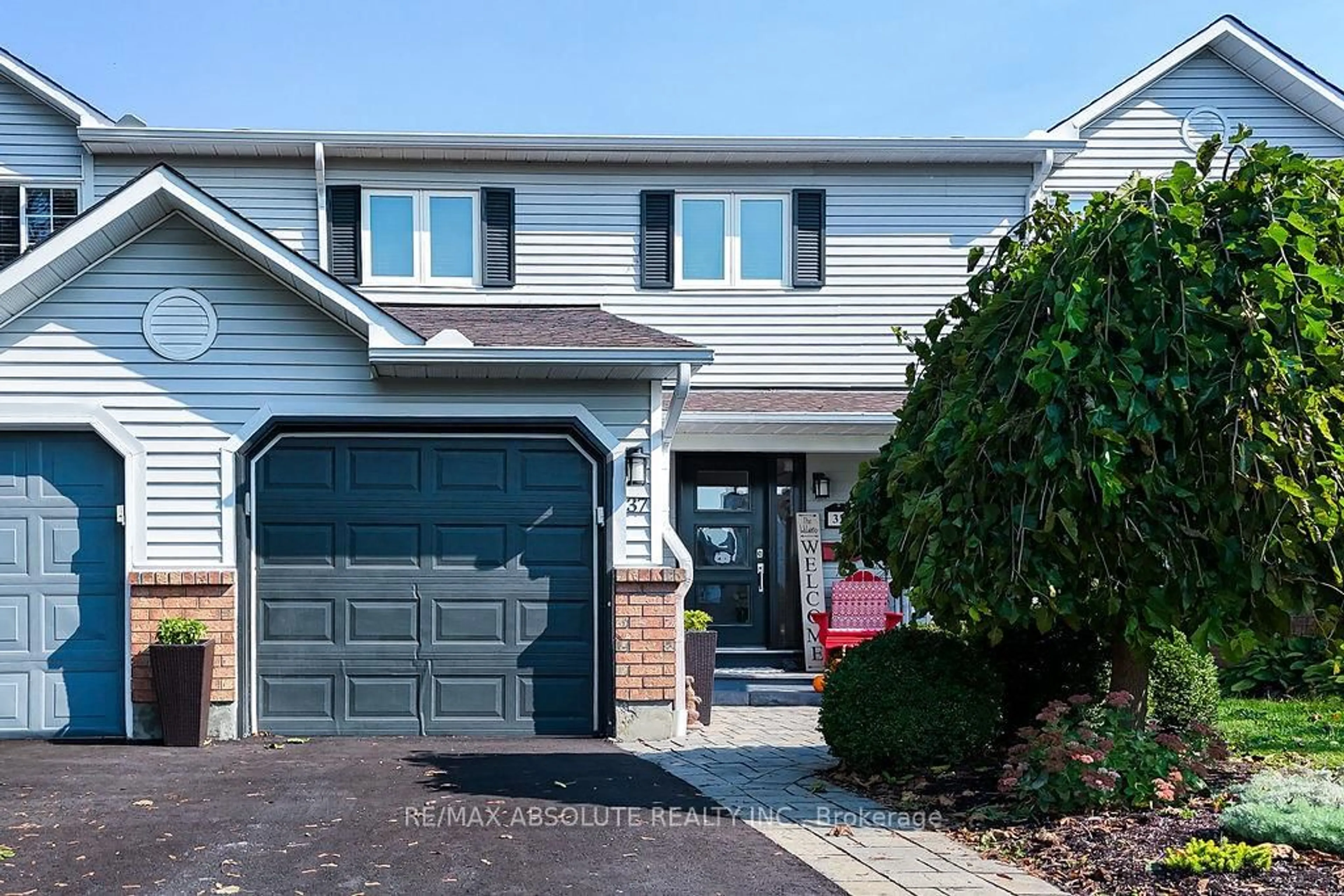 Home with vinyl exterior material, street for 37 Randall James Dr, Ottawa Ontario K2S 1L9