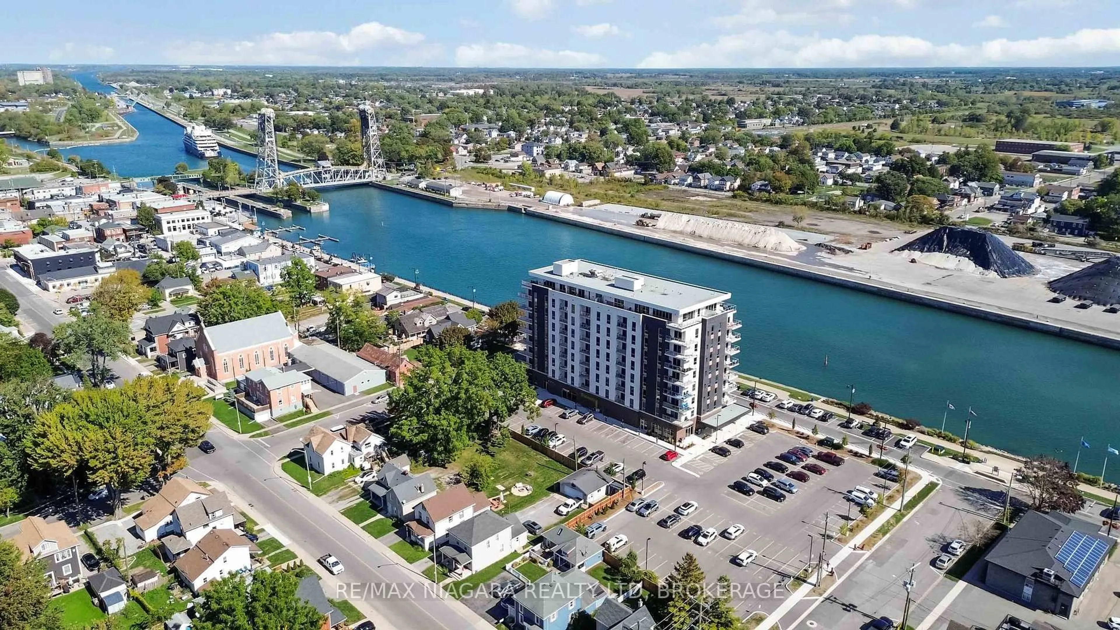 A pic from outside/outdoor area/front of a property/back of a property/a pic from drone, water/lake/river/ocean view for 118 West St #Penthouse Unit 903, Port Colborne Ontario L3K 4C9