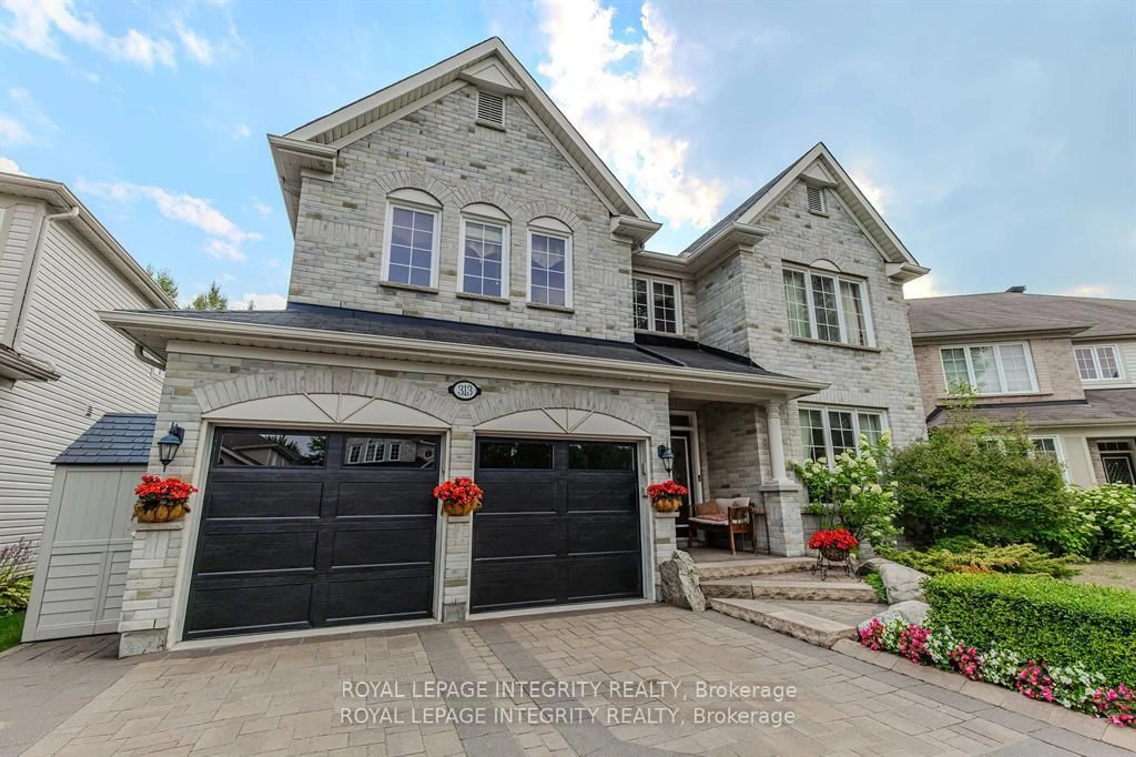 Home with brick exterior material, street for 313 Eckerson Ave, Ottawa Ontario K2S 0K8