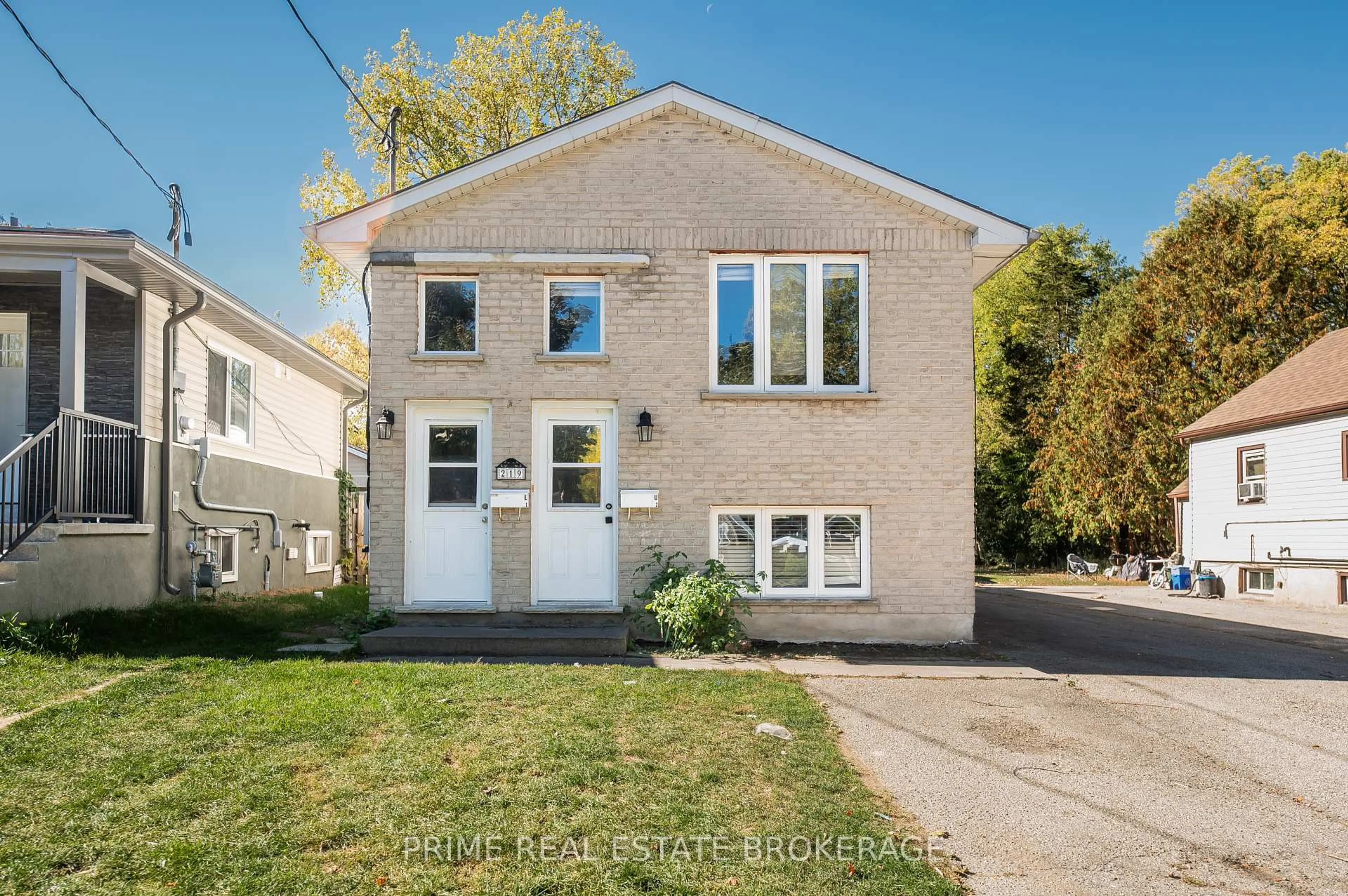 Home with brick exterior material, street for 219 Emerson Ave, London South Ontario N5Z 3L5