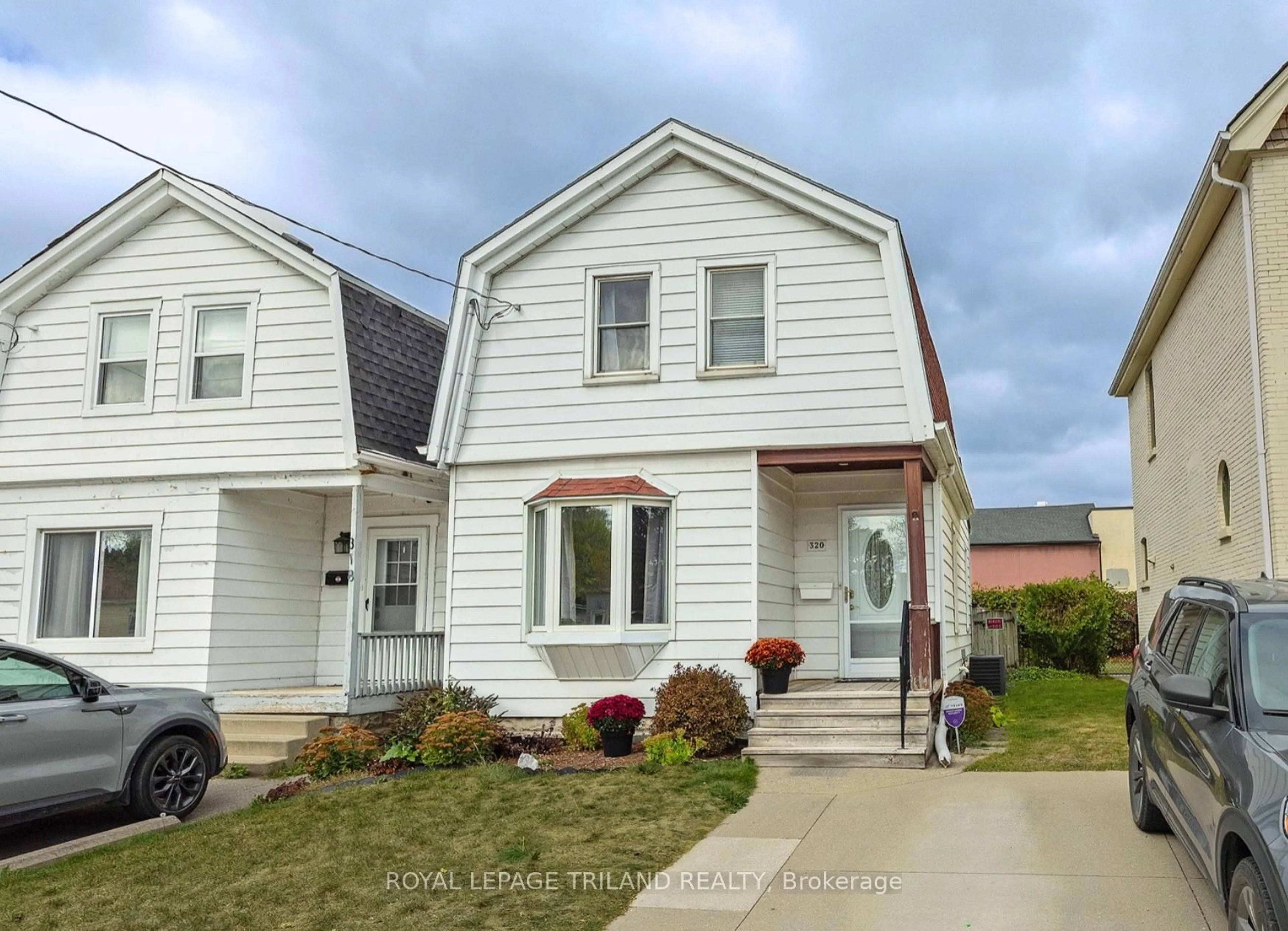 Home with vinyl exterior material, street for 320 Horton St, London East Ontario N6B 1L4